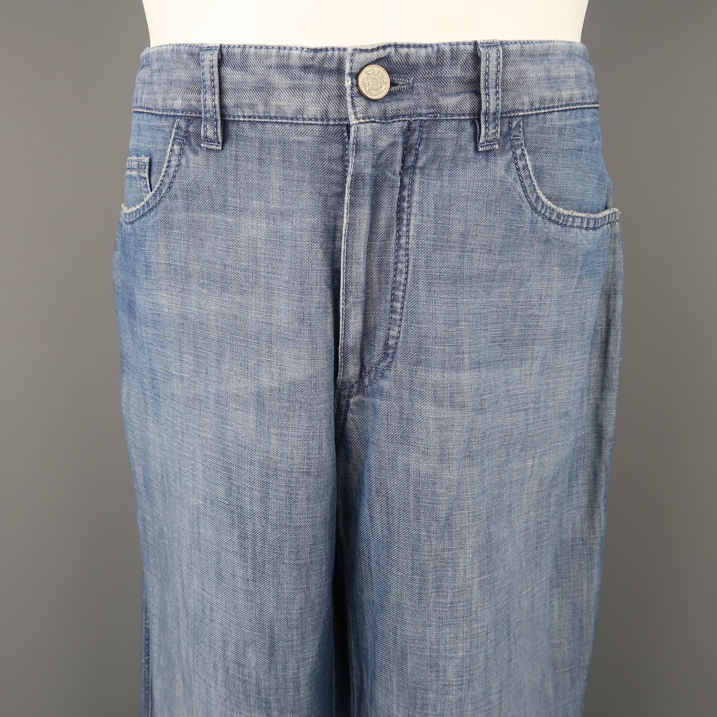 BRIONI straight leg  jeans come in a medium blue linen like light weight denim with a classic five pocket zip fly style. Made in Italy.
 
Good Pre-Owned Condition.
Marked: 32 R
 
Measurements:
 
Waist: 32 in.
Rise: 9.5 in.
Inseam:  30 in.
