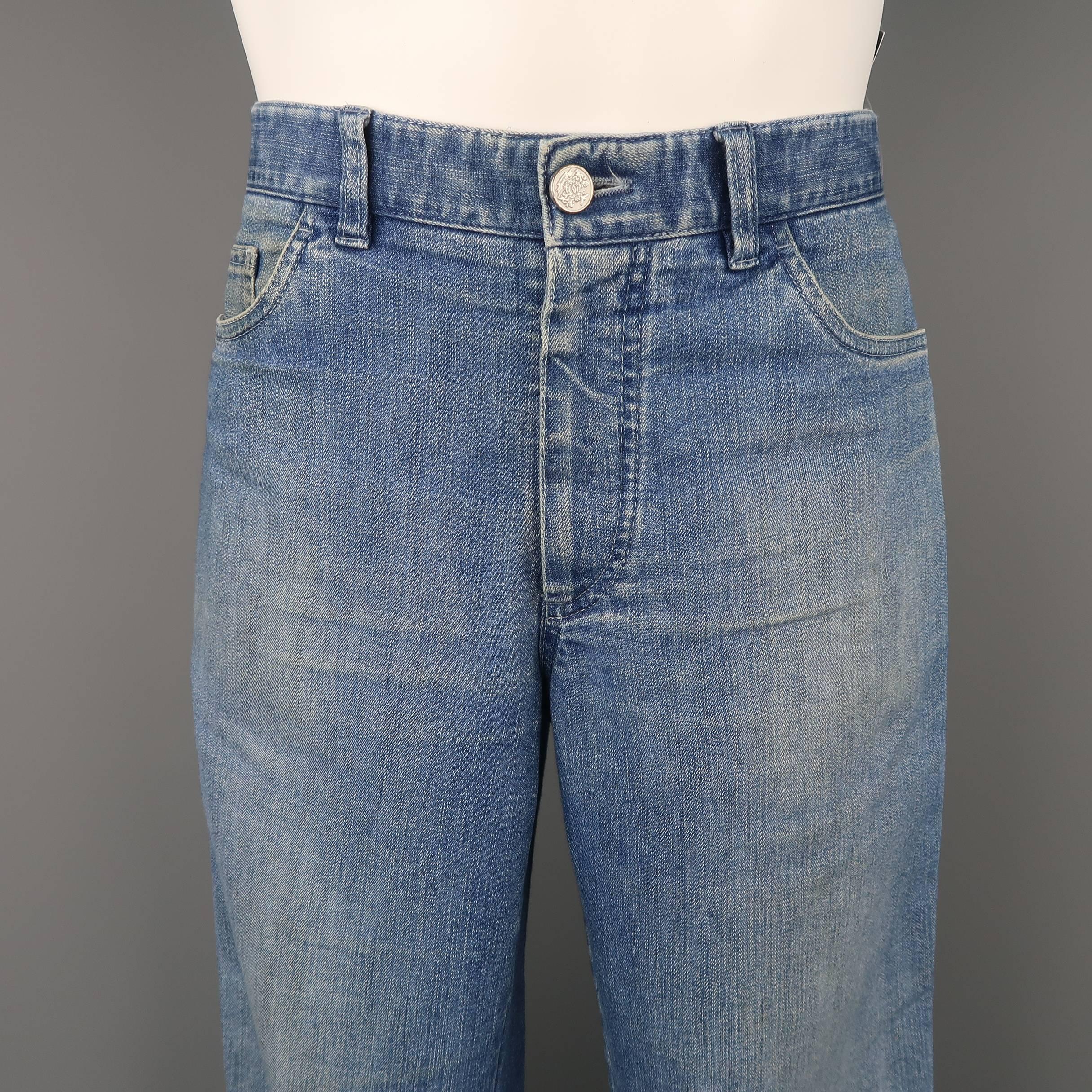 BRIONI straight leg jeans come in a light medium dirty wash denim with an engraved button and classic five pocket style. Wear throughout. As-is. Made in Italy.
 
Fair Pre-Owned Condition.
Marked: 34
 
Measurements:
 
Waist: 34
Rise: 9.5 in.
Inseam: