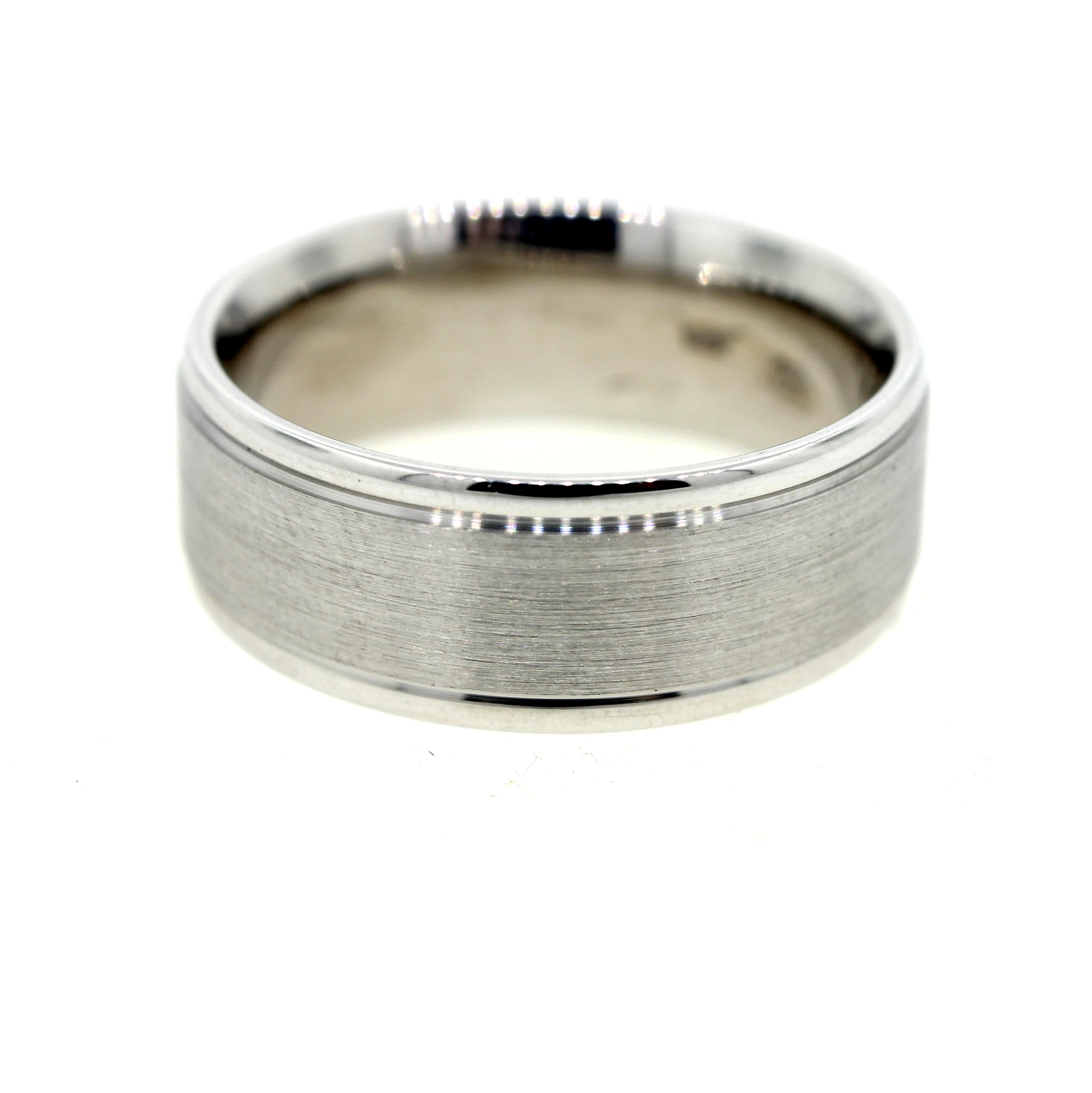 This men's brushed white gold wedding band featured high polish rounded edges for a contrasting look. 