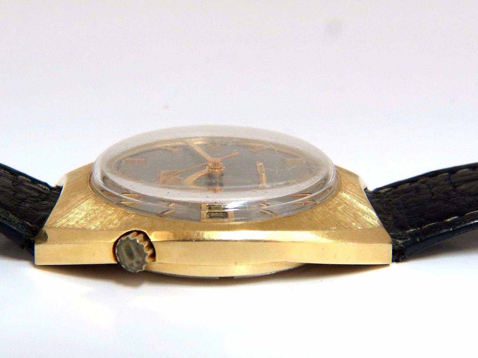 Classic Bulova

Vintage Accutron

Automatic Movement 

Working and tested

14kt. Yellow gold 

46.4 grams.

33 X 40mm case

Condition:
Watch has been inspected & approved for working order with all movements.

The dial has some dust marks on