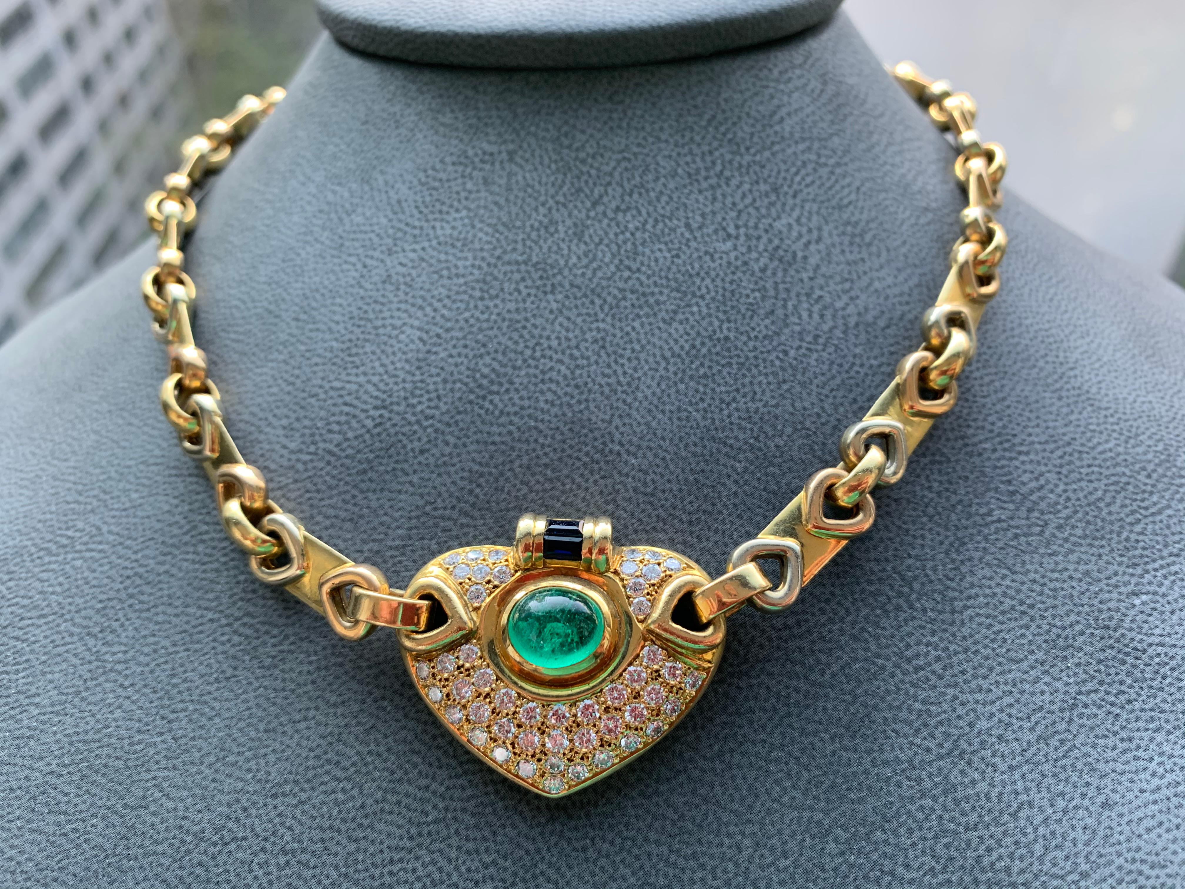 Cabochon Emerald and Diamond Necklace

18 karat gold necklace with 1 emerald cabochon approx 3.26 carat, 98 round diamonds approx 2.85 accented with bagguete sapphires
Weight:  75.9 grams
Approx 16.50 inches long