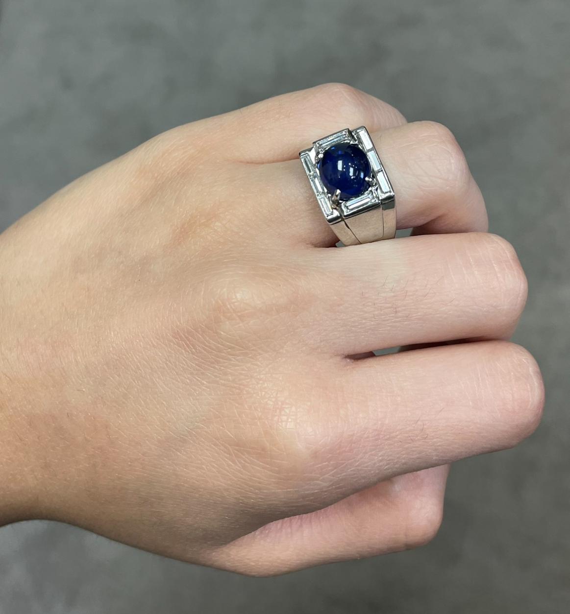 Men's Cabochon Sapphire Ring

A platinum ring set with a cabochon sapphire accented by baguette cut diamonds

Approximate Sapphire Weight: 4.34 carats
Approximate Diamond Weight: .75
Ring Size: 8.75 
Resizable free of charge
Metal Type: Platinum