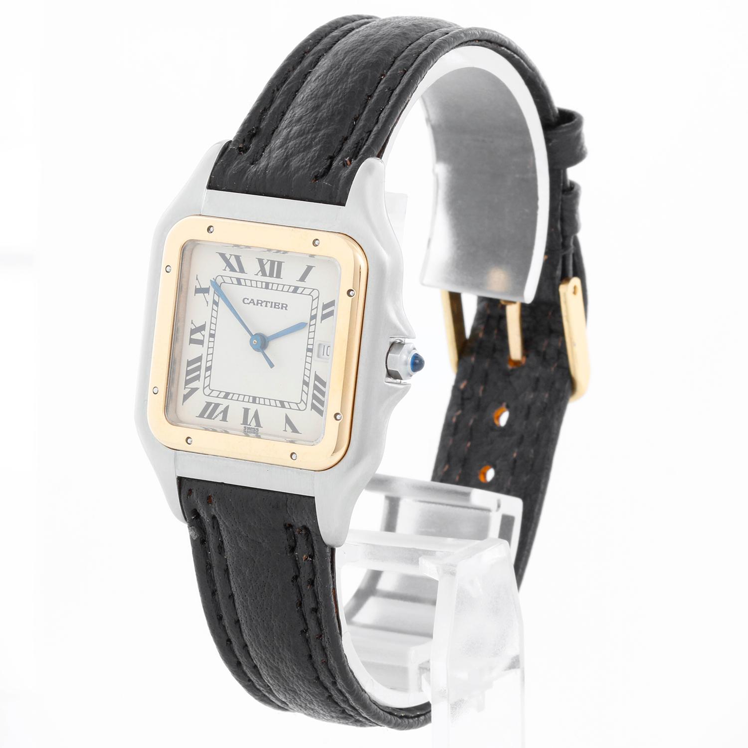Men's Cartier Panther 2-Tone Steel & Gold Watch - Quartz. Stainless steel case with 18k yellow gold bezel (29mm x 40mm). Ivory colored dial with black Roman numerals and date at 3 o'clock. Black leather strap and generic buckle. Pre-owned with