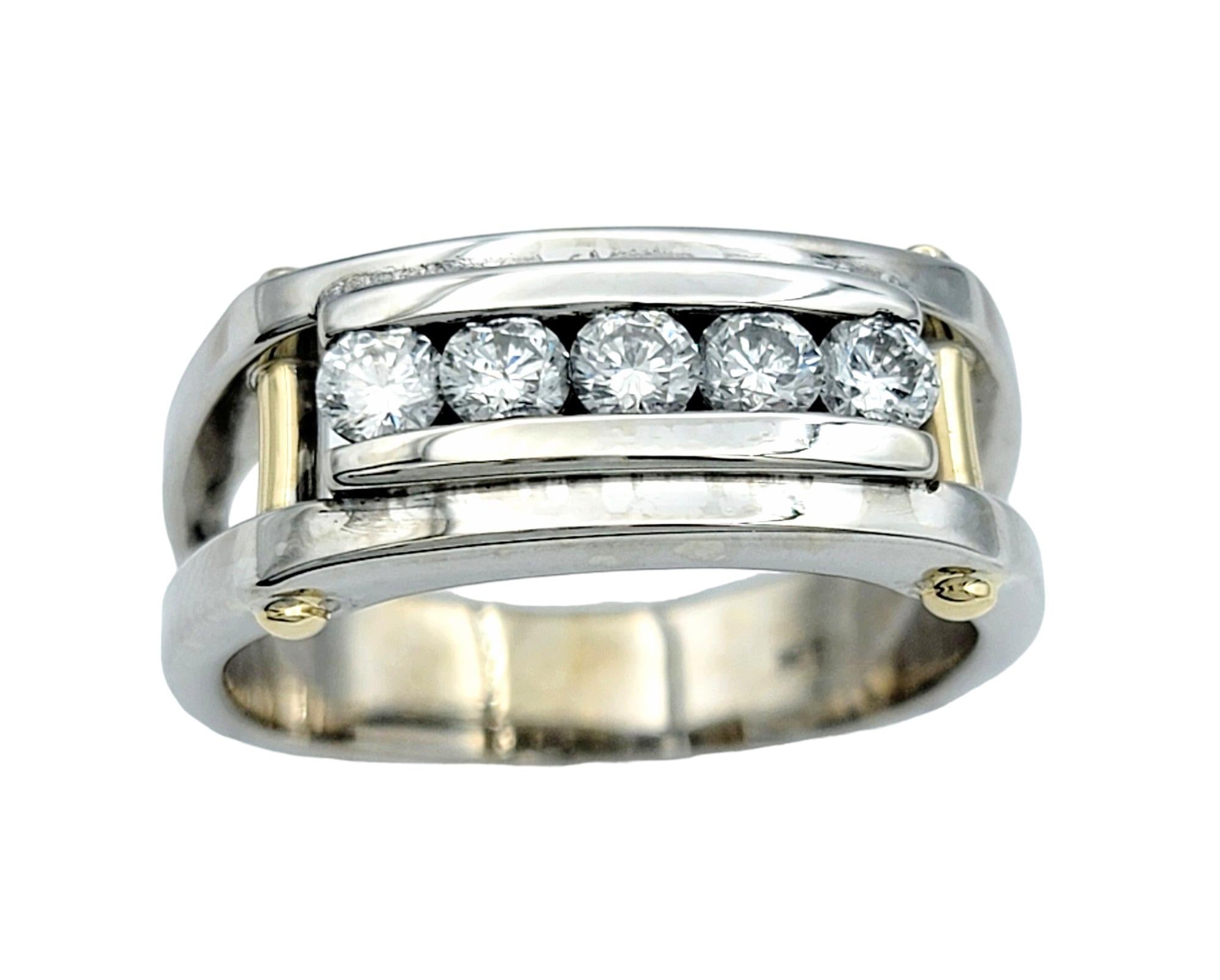 Ring Size: 9.75

Crafted for the modern gentleman, this men's diamond band ring exudes strength and sophistication. Set in a robust combination of 14 karat white and yellow gold, this ring features a bold design that commands attention. The