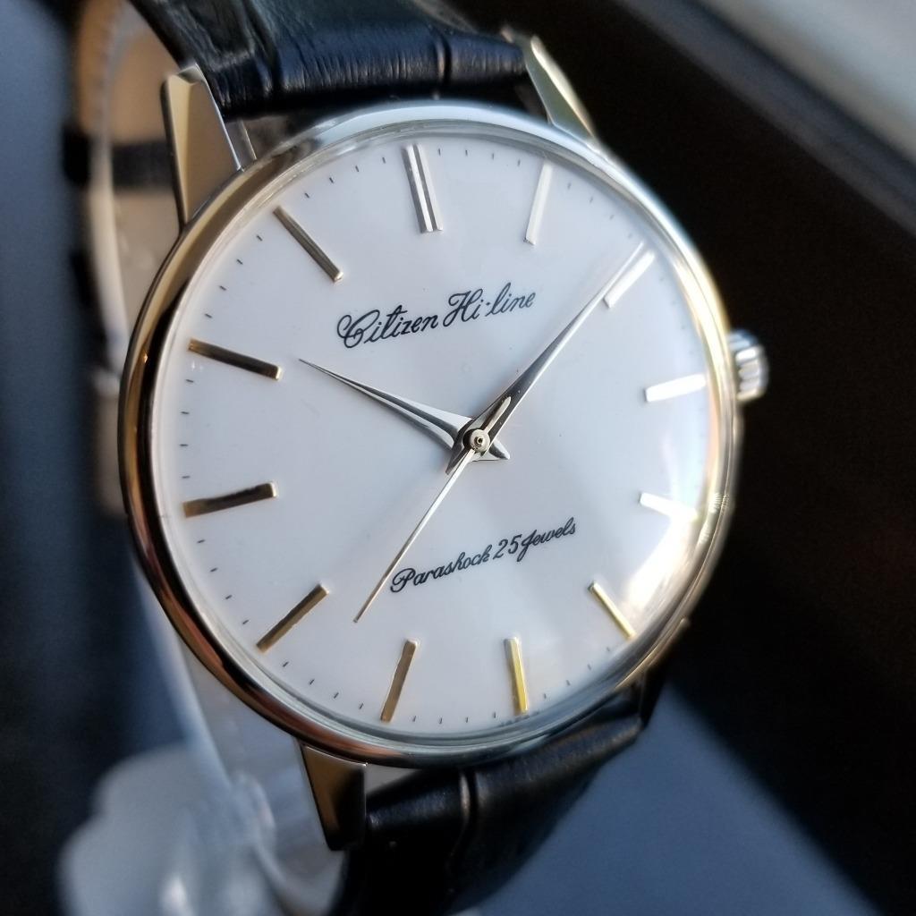 Vintage excellence, Men's Citizens Hi-Line Star hand-wind dress watch, c.1960s. Verified authentic by a master watchmaker. Gorgeous Citizen signed white dial, applied indice hour markers, gilt minute and hour hands, sweeping central second hand,