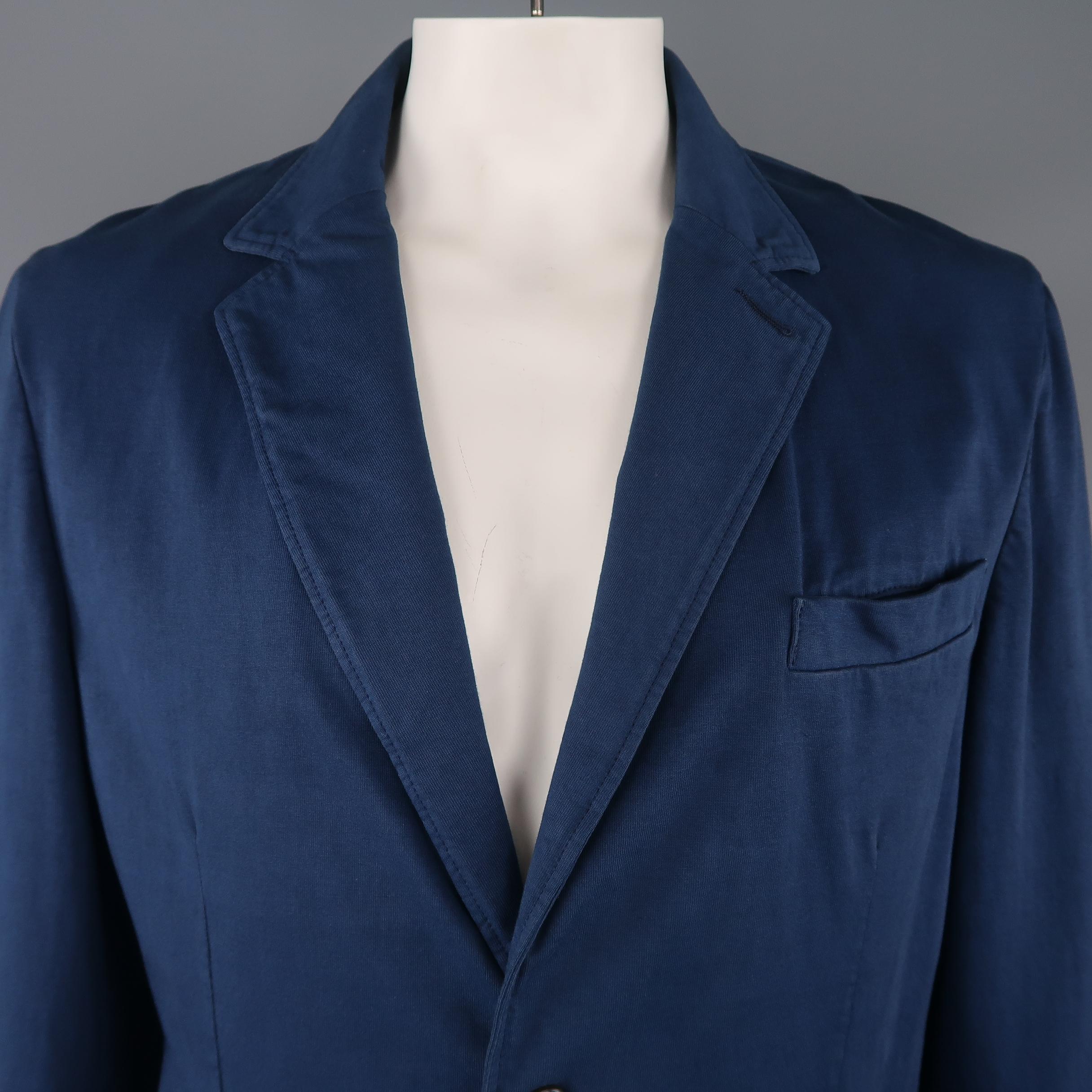 CLOSED casual sport coat jacket comes in muted navy blue jersey with a notch lapel, two button, single breasted front, and patch pockets. Made in Italy.
 
Very Good Pre-Owned Condition.
Marked: IT 52
 
Measurements:
 
Shoulder: 19 in.
Chest: 48