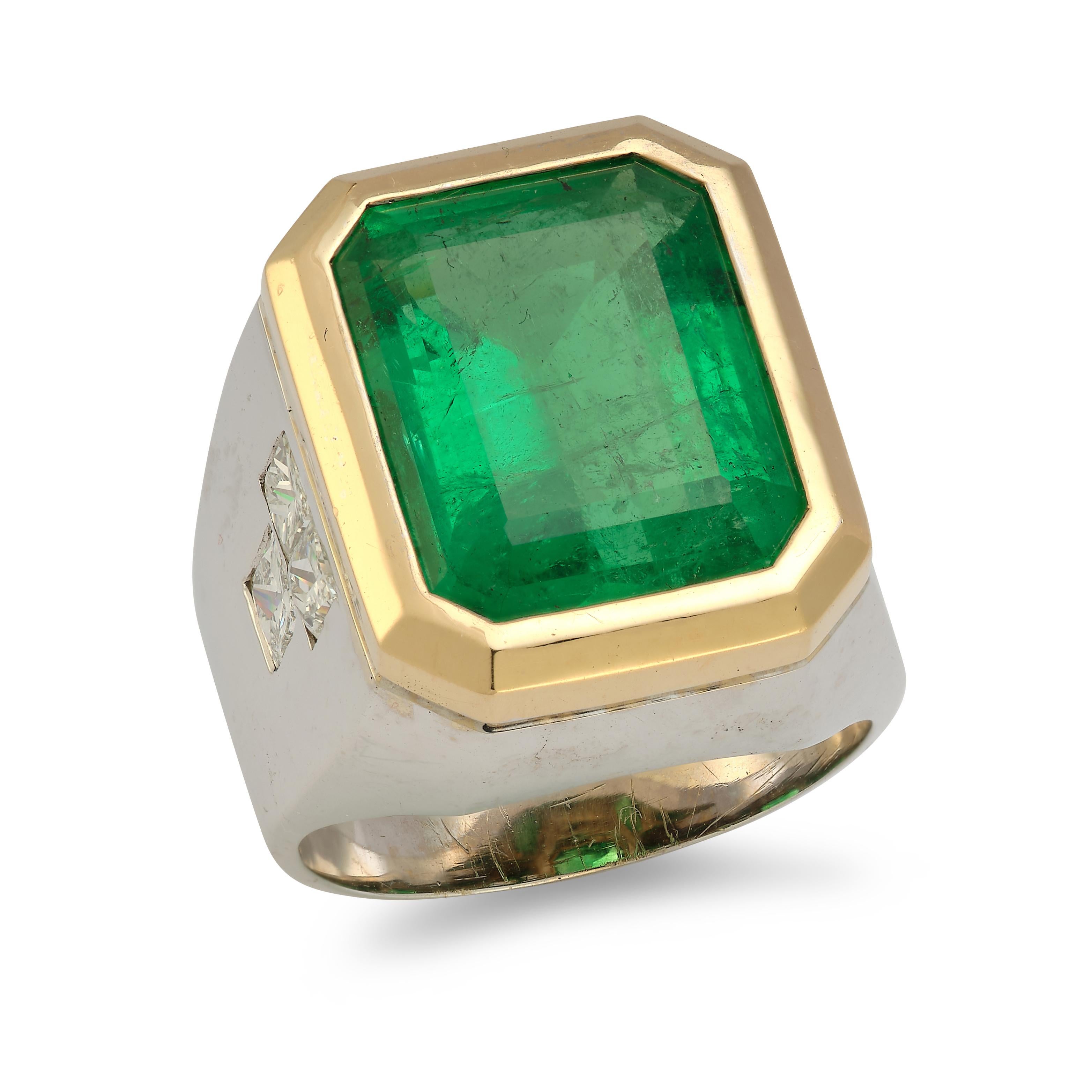  Men's Emerald Cut Emerald Ring, set in 18K White & Yellow Gold. 
Emerald Weight: Approx 12.70 Cts
Ring Size: 8.5
Re-sizable free of charge 
