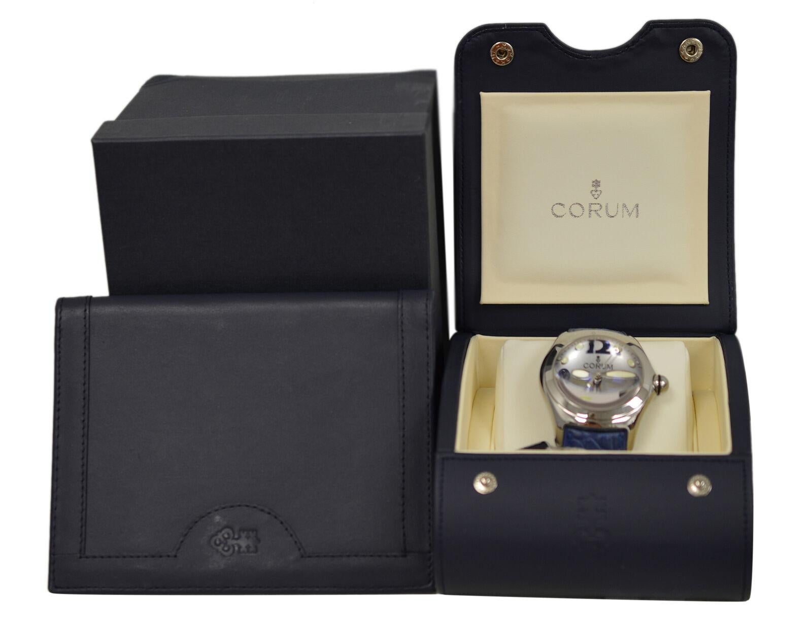 Brand	Corum
Model	Bubble 82.150.20 0F06
Gender	Men's
Condition	New store display
Movement	Swiss Automatic
Case Material	Stainless Steel
Bracelet / Strap Material	
Leather

Clasp / Buckle Material	
Stainless steel	
Clasp Type	Butterfly