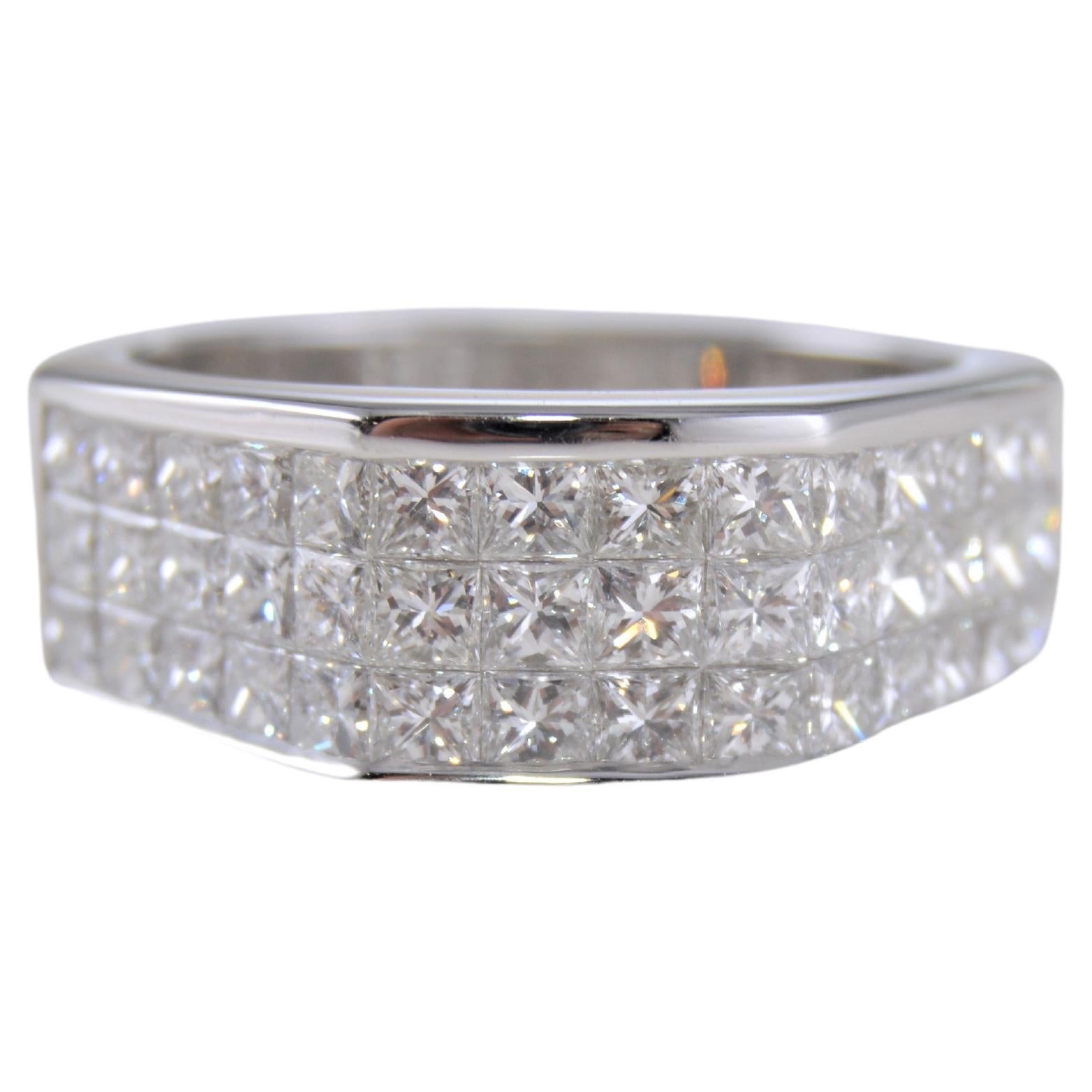 STYLE / REFERENCE: Ring
METAL / MATERIAL: 18 Karat White Gold
CIRCA / YEAR: Contemporary
DIAMOND WEIGHT: 2.89cts Total Weight
COLOR: F/G CLARITY: VS
SIZE:  8 3/4

This architecturally inspired Diamond ring is beautifully hand crafted in bright and