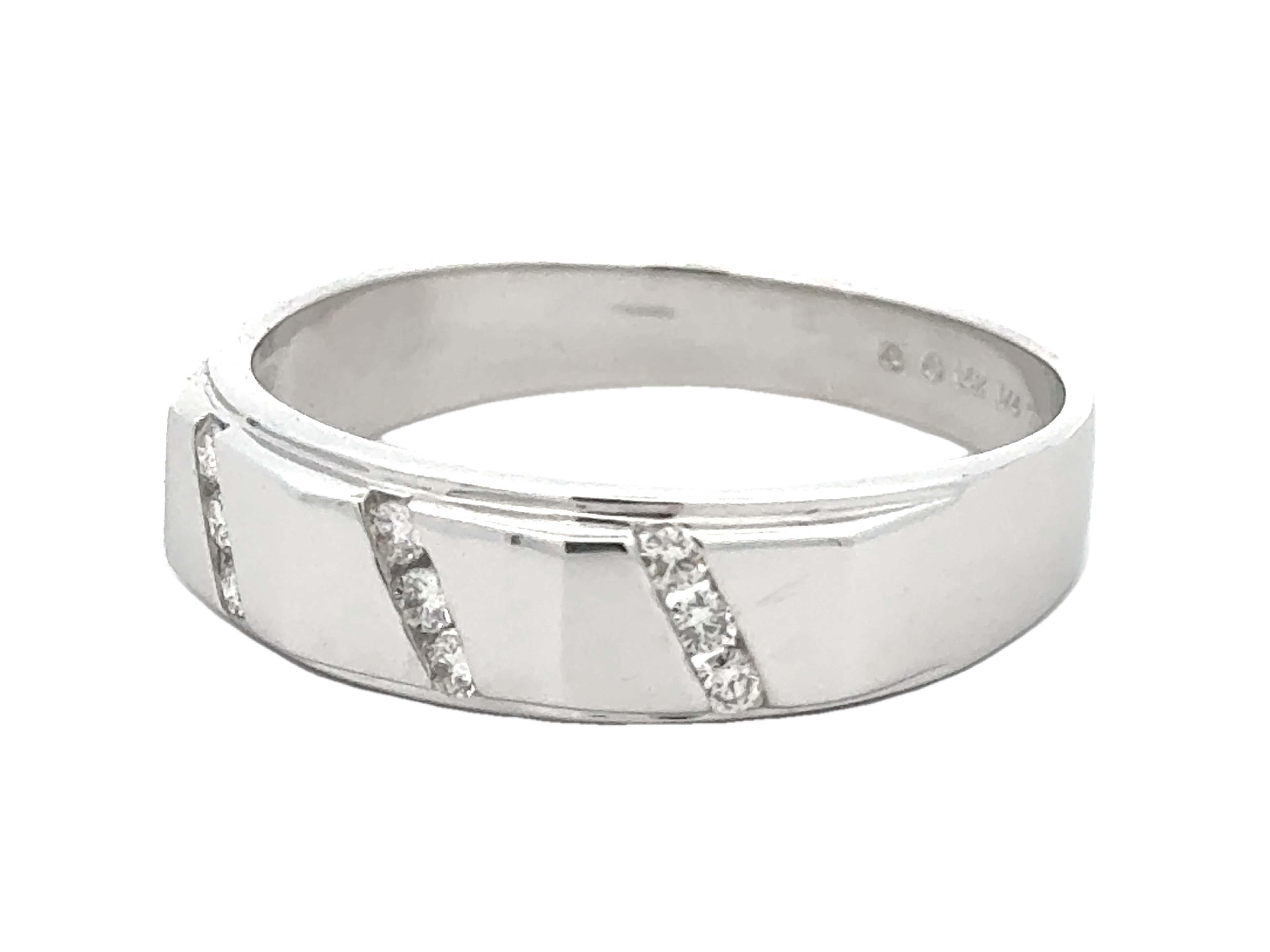 Item Specifications:

Metal: 14k White Gold

Diamond Count: 9 brilliant cut

Total Diamond Carat Weight: ~0.25 carats 

Ring Size: 16
​
​Ring Height: 7.3 mm tall

Total Weight: 8.2 Grams

Stamped: 