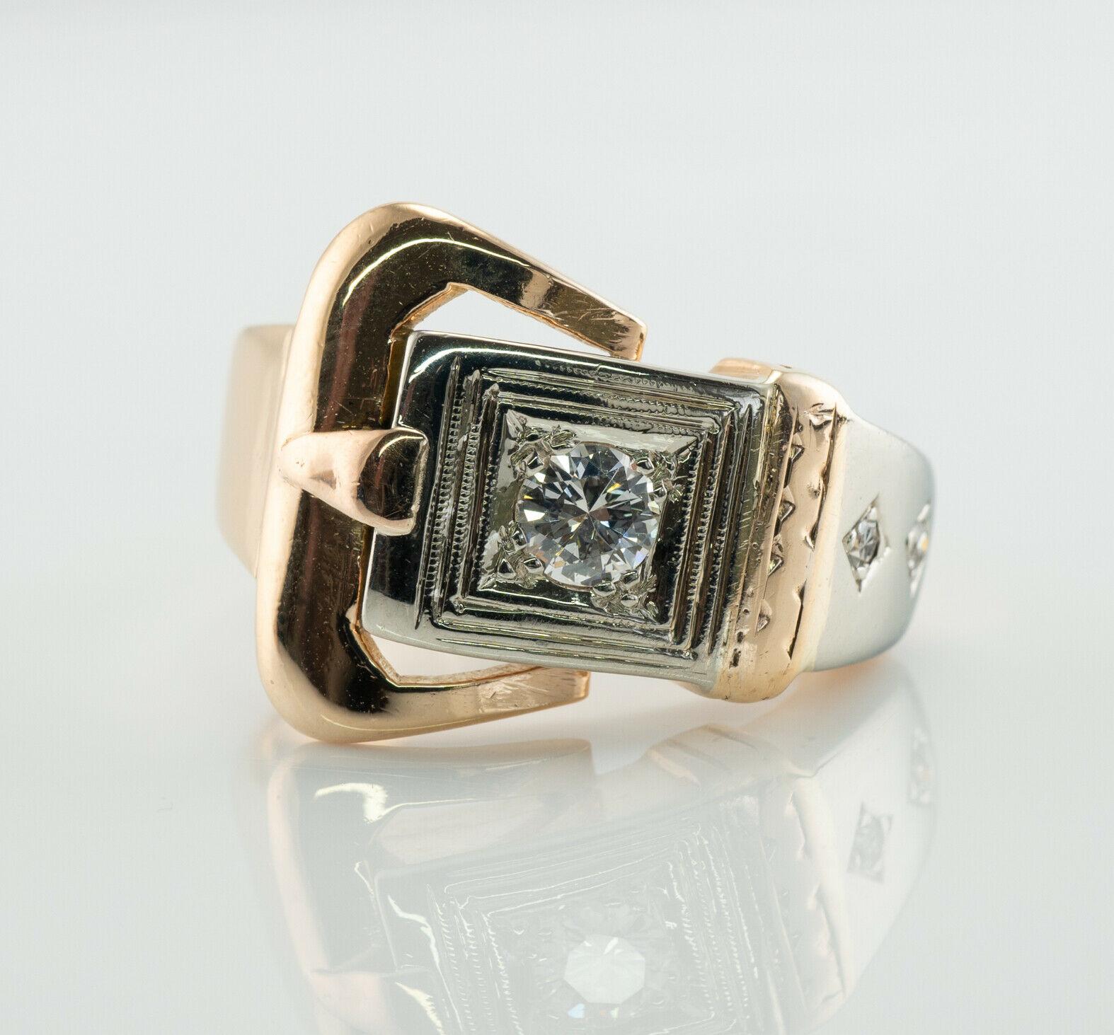 Mens Diamond Belt Buckle Ring 14K Gold Band Vintage

This beautiful vintage solid 14K Gold ring is made in the shape of the buckle and set with natural diamonds. 
The center .30 carat diamond is VS1 clarity and G color. Two single cut diamonds are