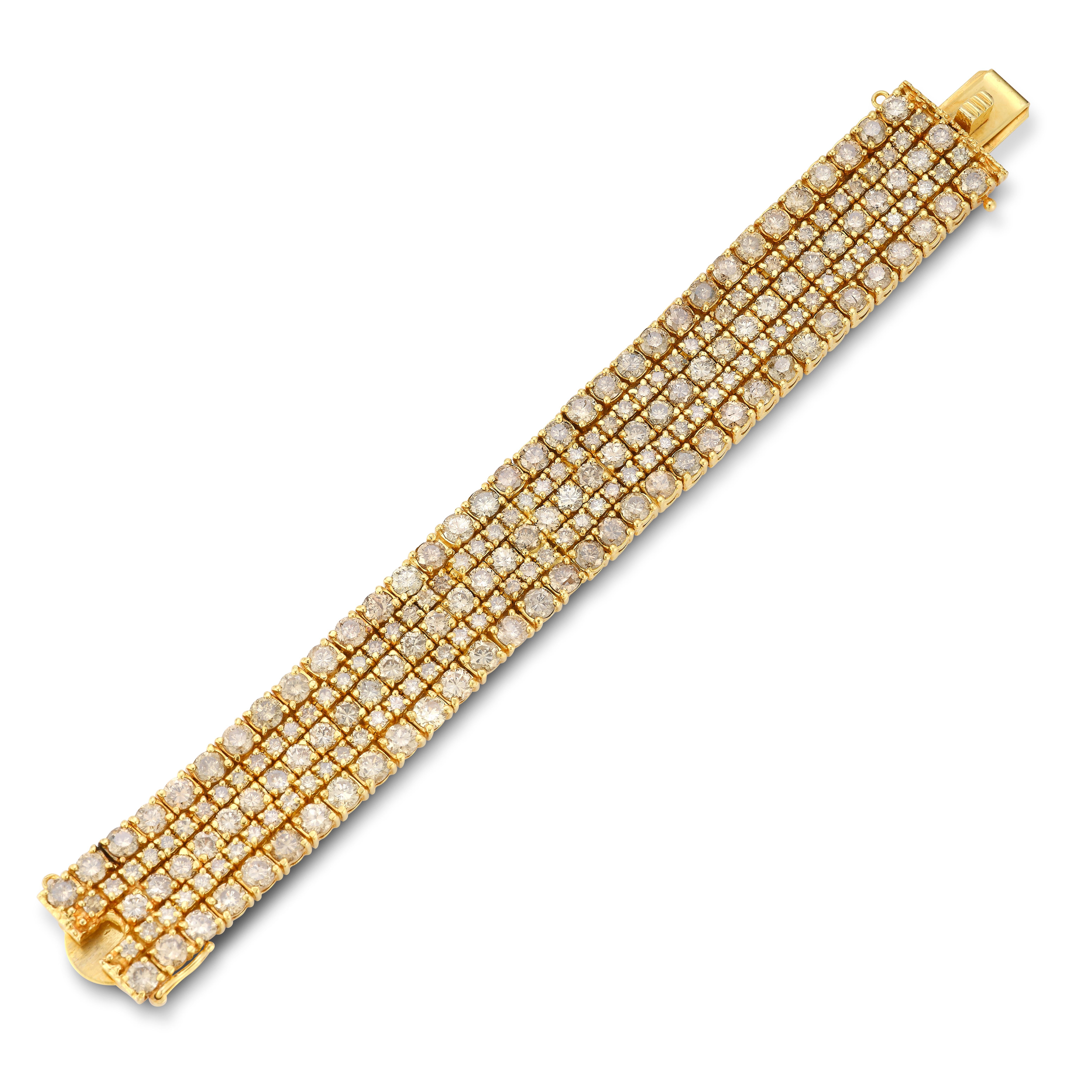 Men's Diamond Bracelet 

Approx 41.40 ct diamonds

Made Circa 1970

6 3/4 inches long

14 Karat yellow gold