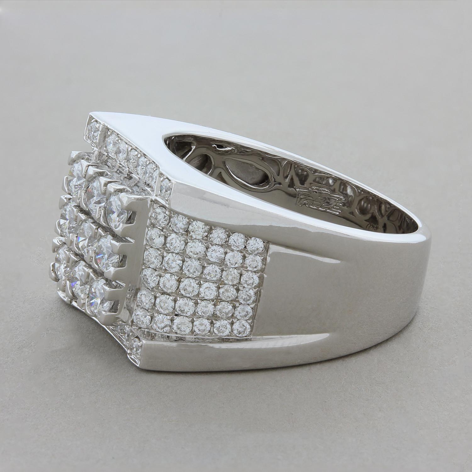 This exquisite men’s ring features 2.48 carats of round cut diamonds. The 14K white gold setting has a flat top with three sides giving it a unique flare.

Ring Size 10.75 (Sizable)
