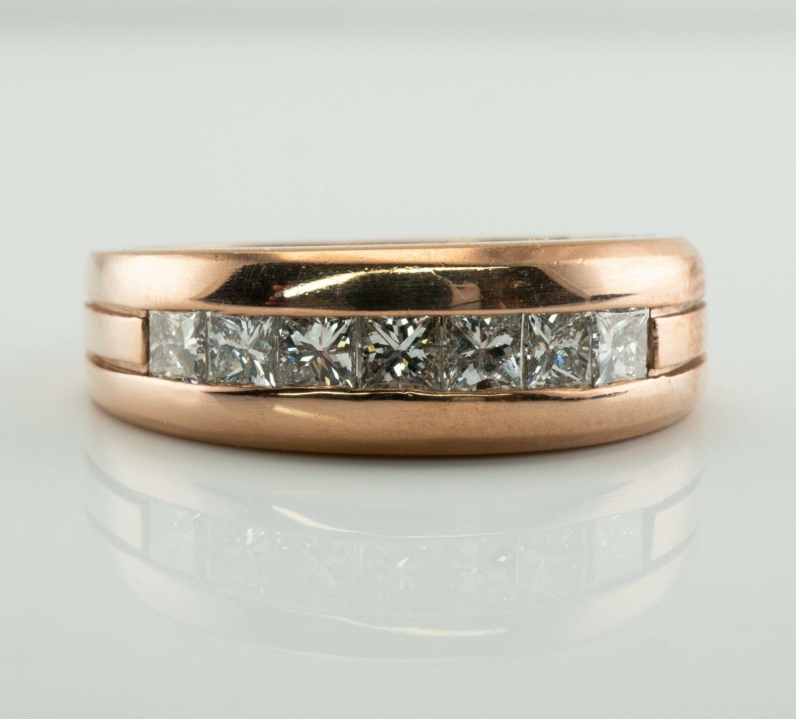 Mens Diamond Ring Princess cut 18K Rose Gold Band Wedding

This vintage ring is crafted in solid 18K Rose Gold.
Seven princess cut diamonds total 1.26 carats of VS2-SI1 clarity and H color.
The top of the ring measures 6.5 mm vertically.
Size 8.5