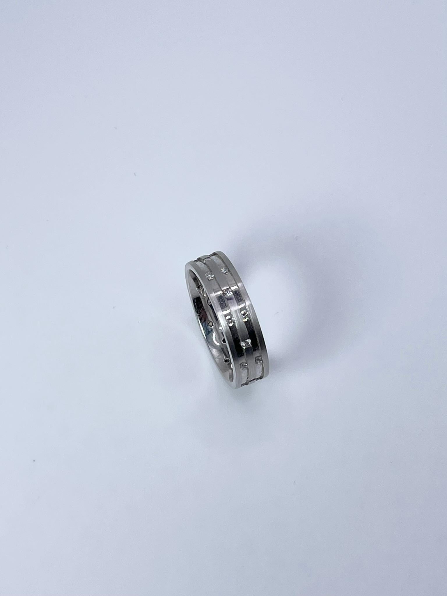 Diamond ring made in platinum with natural diamonds and geometric design!

GRAM WEIGHT: 2.00gr
METAL: platinum

NATURAL DIAMOND(S)
Cut: 
Round Brilliant
Color: F-G
Clarity: SI 
Carat: 1.25ct
Size: 6 ( can be re-sized)


WHAT YOU GET AT STAMPAR