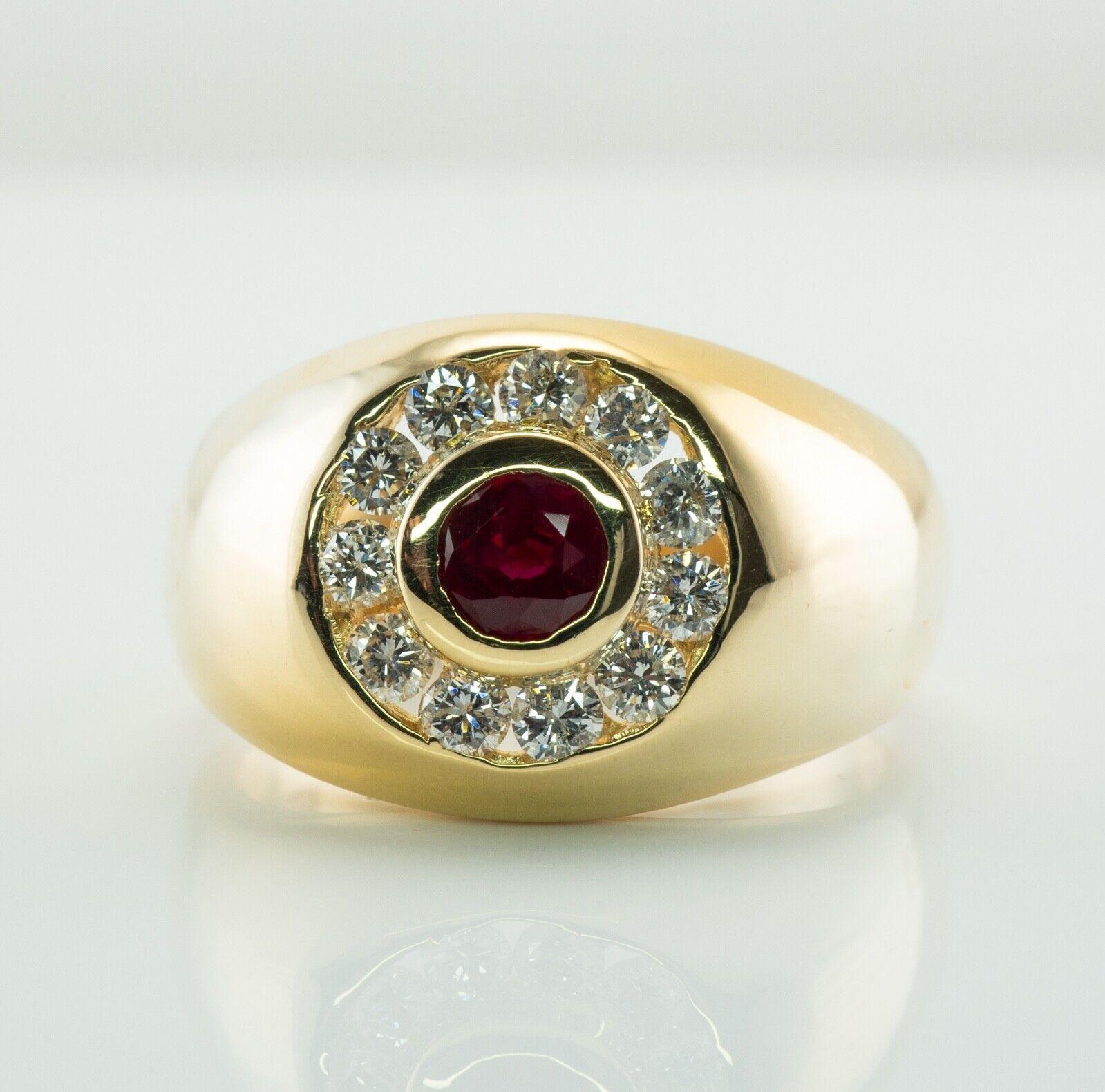 This gorgeous estate ring for a gentleman is finely crafted in solid 14K Yellow Gold. The center genuine Earth mined round cut Ruby measures 4.2 mm (.36 carat). This is a very clean and transparent gem of great intensity and strong brilliance.