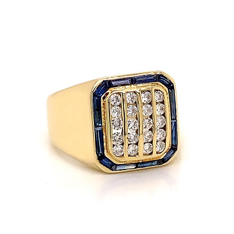 Beautiful men's Diamond and Sapphire ring in 14K yellow gold. This ring features 4 rows of 5 round brilliant cut diamonds in channel sets. The diamonds are surrounded by 12 baguette blue sapphires creating a cushion shaped halo around the diamonds.