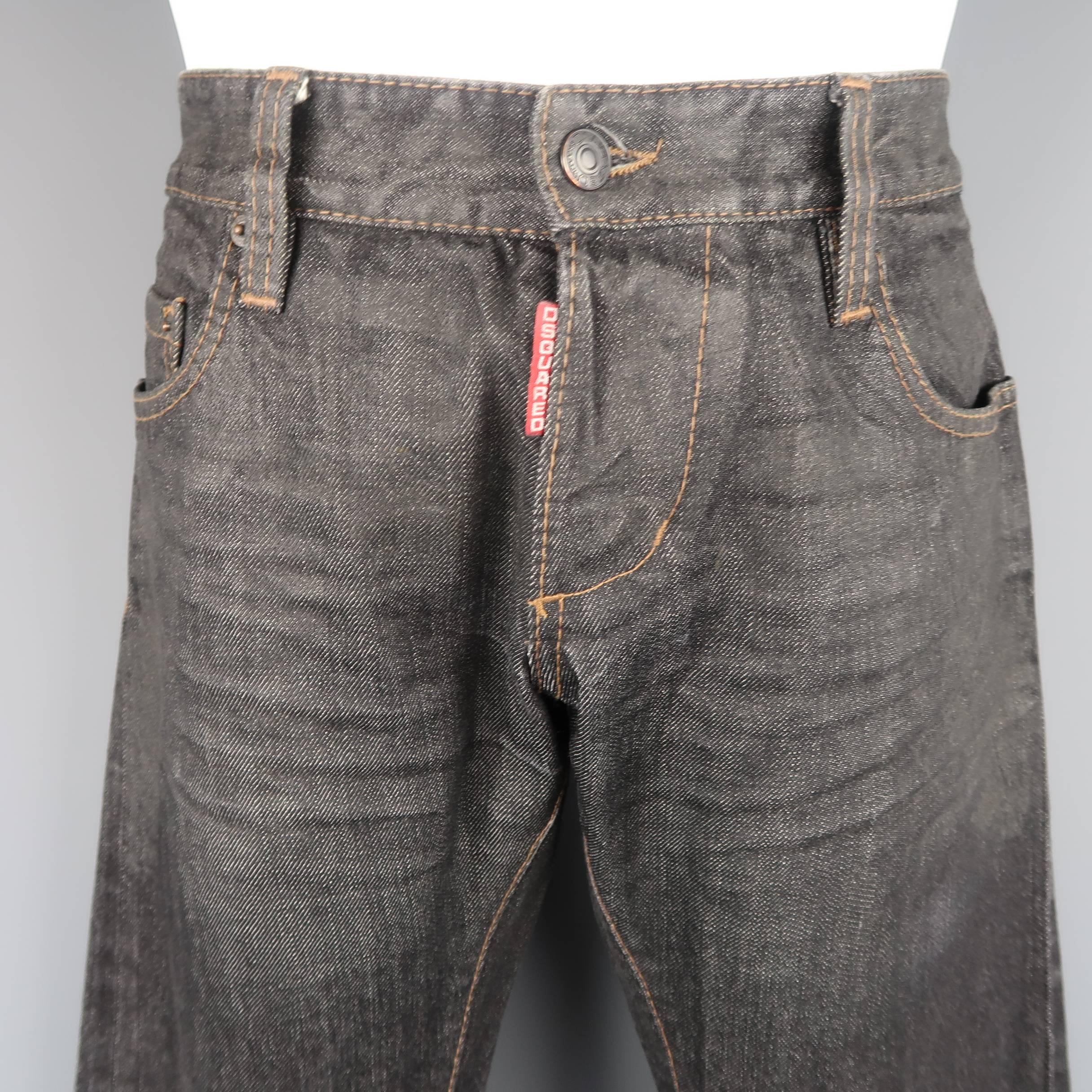 DSQUARED2 jeans come in charcoal raw selvedge denim with a red logo tab fly, distressed wax coated effect top, and permanent cuffed hem. Made in Italy.
 
Good Pre-Owned Condition.
Marked: IT 48
 
Measurements:
 
Waist: 34 in.
Rise: 8.5 in.
Inseam: