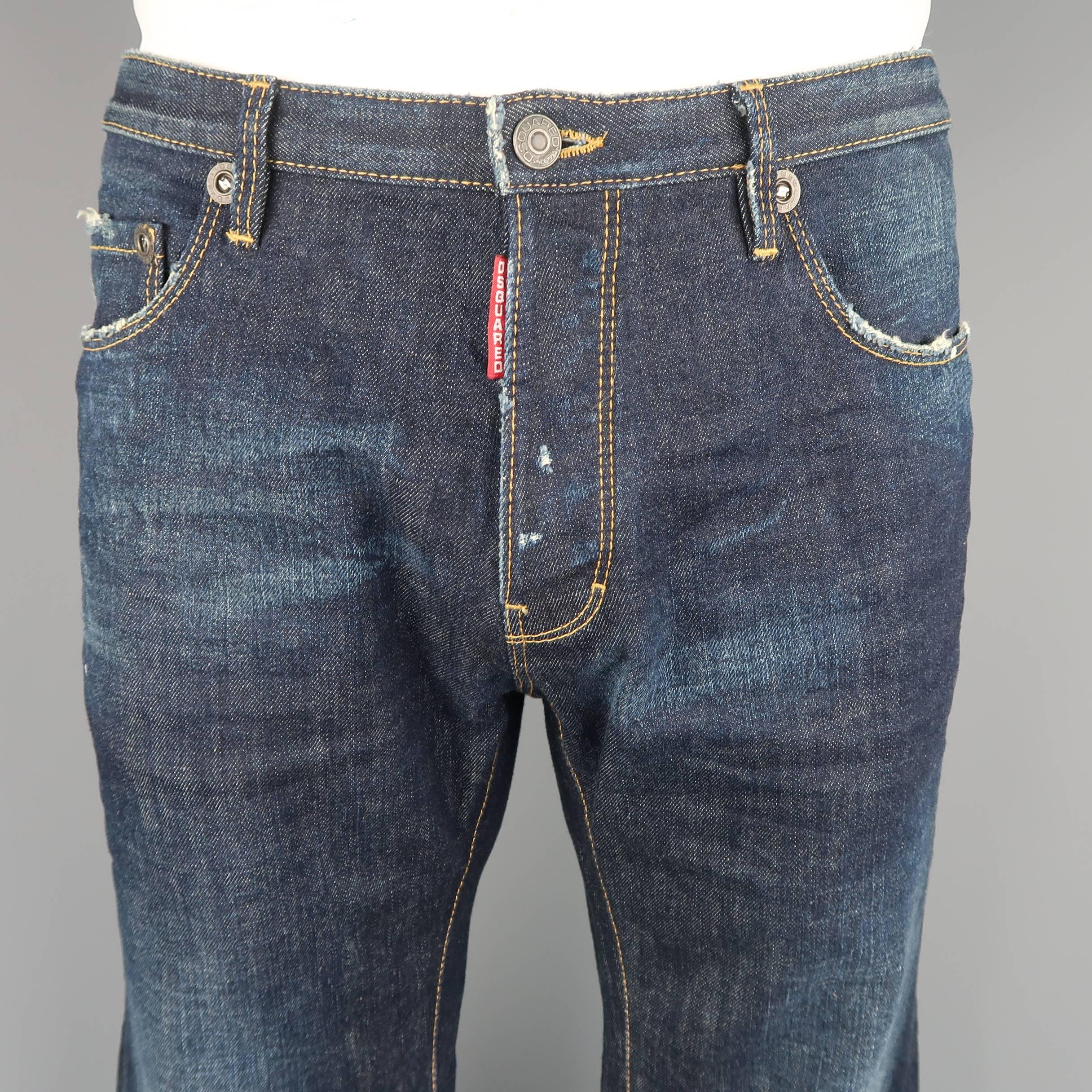 DSQUARED2 jeans come in dark dirty washed denim with contrast stitching, logo tab fly, white paint splatters, and distressed details throughout. Made in Italy.
 
Excellent Pre-Owned Condition.
Marked: IT 50
 
Measurements:
 
Waist: 36 in.
Rise: 10