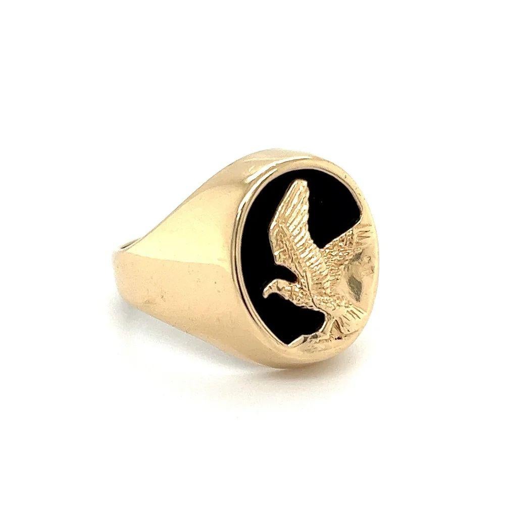 Handsome Fine Quality Gent’s Eagle Over Onyx Tablet Hand crafted 14K Yellow Gold Signet Ring. Approx. Dimensions: 1.02