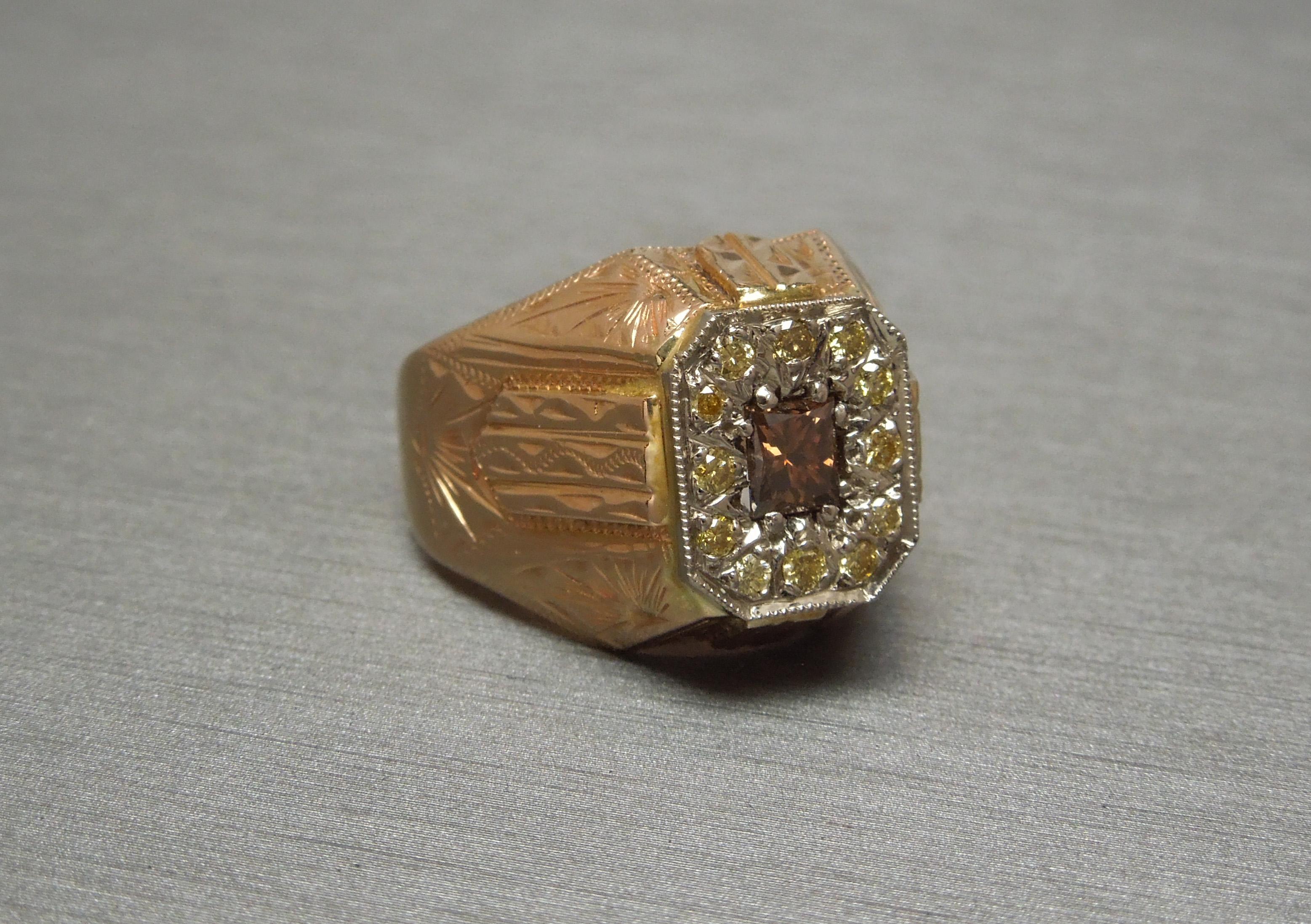 This Men's Diamond Pyramid Ring is crafted in an Egyptian Revival style inspired by Art Deco construction. In 14KT Gold with a slight rosy tinge, giving the appearance of Rose Gold - with a 14KT White Gold plate encasing Diamonds. Representing an
