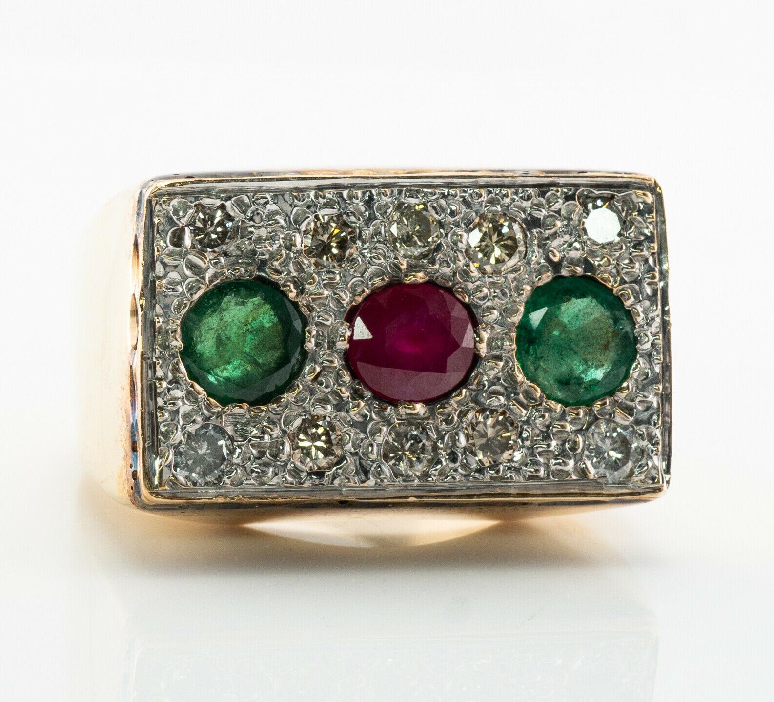 This beautiful vintage ring for a man is finely crafted in solid 14K Yellow gold and White gold for the top. Two 5mm natural Earth mined Emeralds and one 5mm Ruby totaling 1.61 carats. Ten round cut diamonds range from VS2 to SI2 clarity and I to K