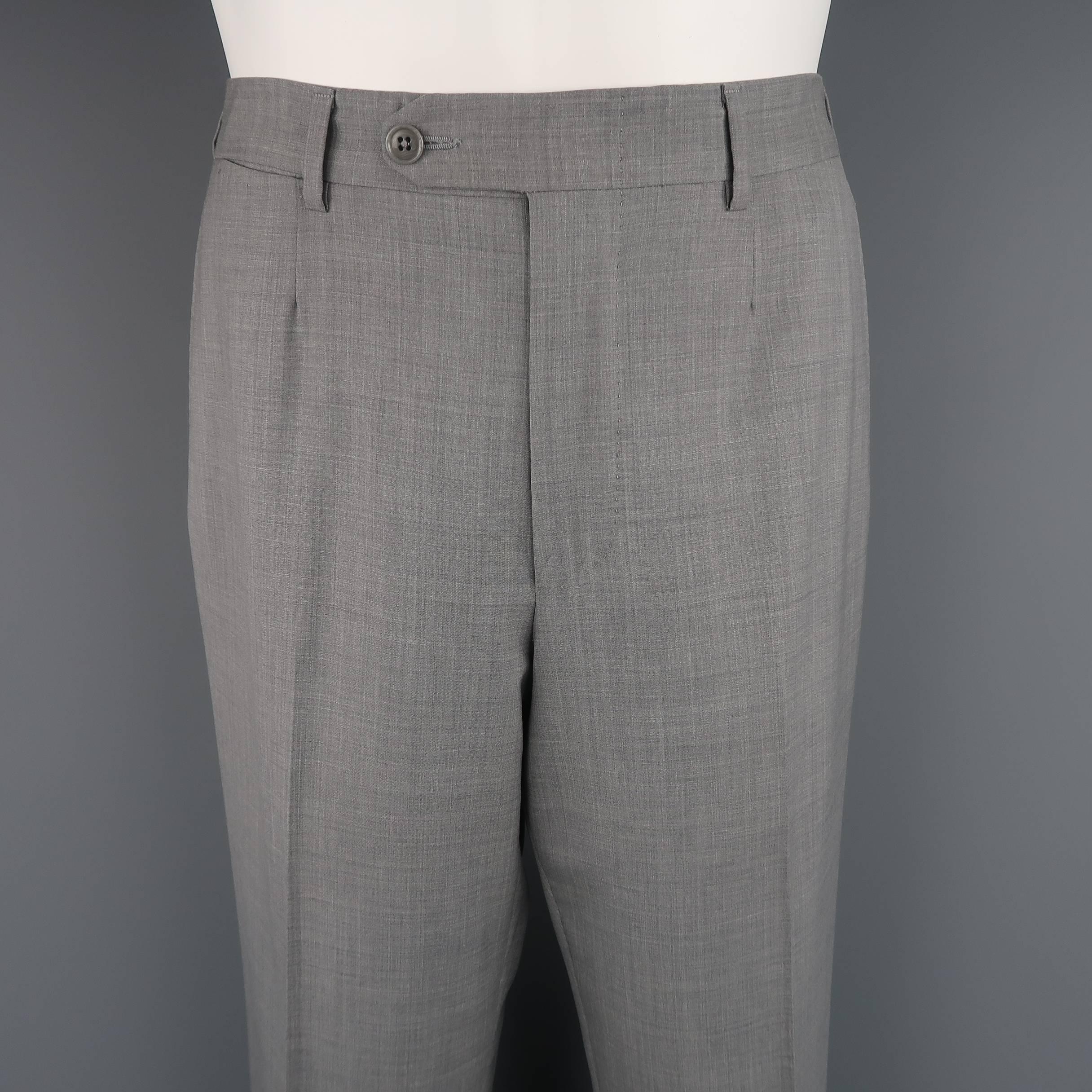 ERMENEGILDO ZEGNA dress pants come in a textured wool with a flat front. Made in Spain.
 
Excellent Pre-Owned Condition.
Marked: IT 48 R
 
Measurements:
 
Waist: 32 in. (+2 in. )
Rise: 10.5 in.
Inseam: 31 in. (+2.25 in. )
 
(Let Out Room)

