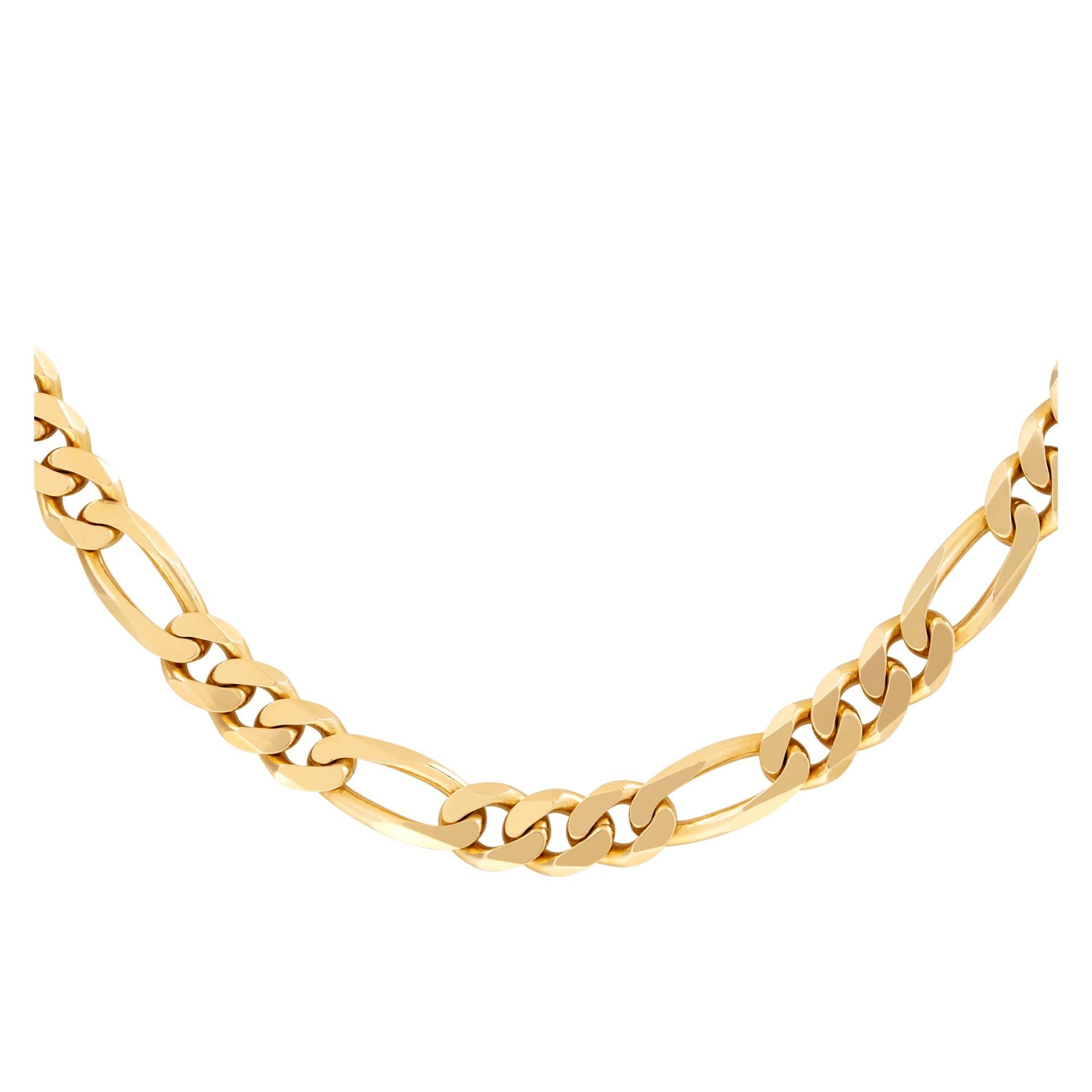 Mens Figaro chain in 18k yellow gold. Length 27 inches. Width 6.2 mm.
