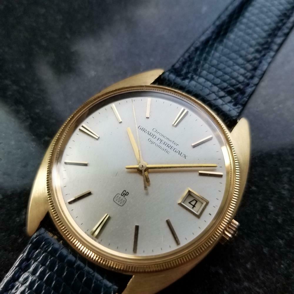 Classic luxury, men's 18K solid gold Girard Perregaux Gyromatic w/date automatic, c.1960s. Verified authentic by a master watchmaker. Gorgeous vintage silver GP signed dial, applied gold baton hour markers, date display at the 3 o'clock position,