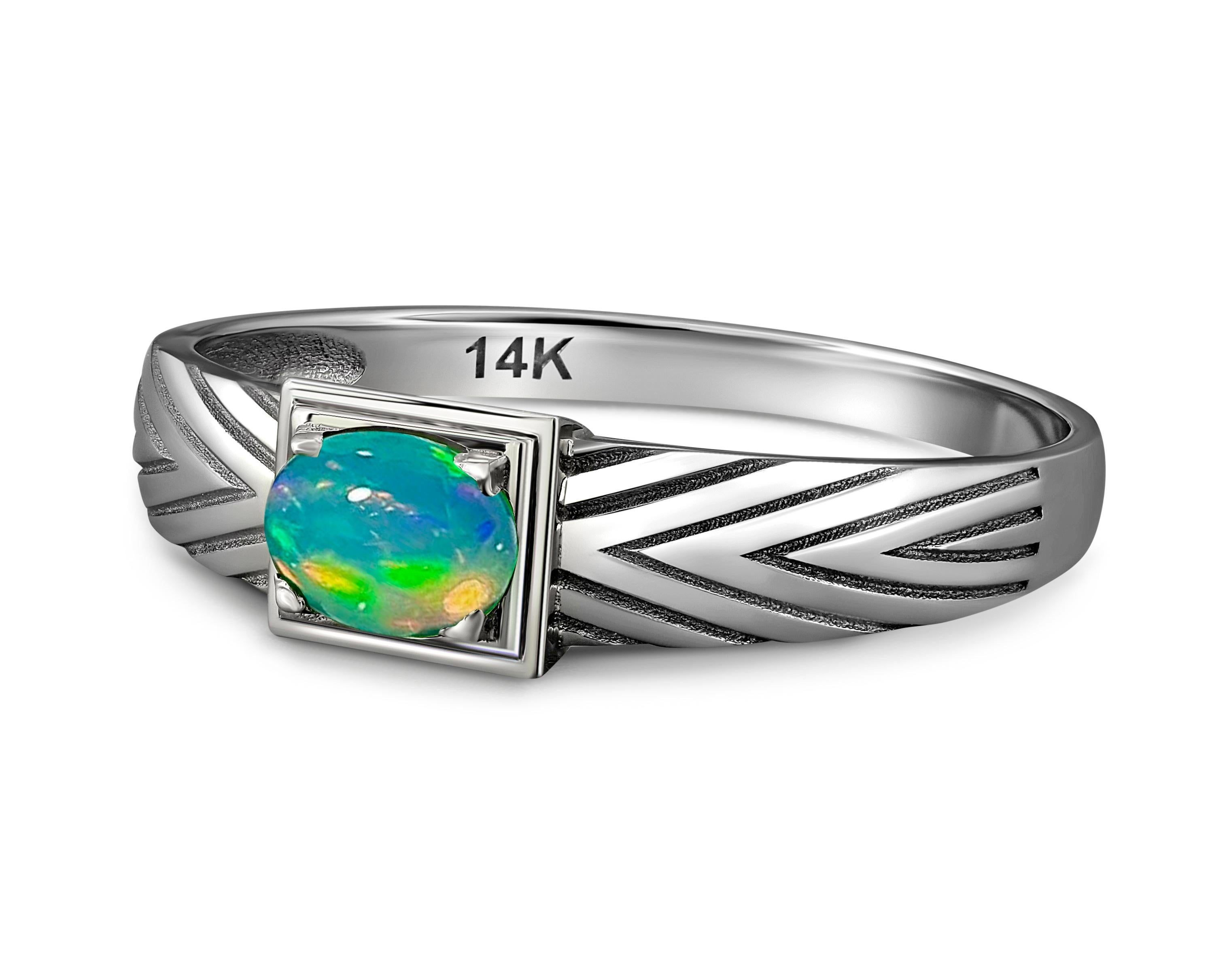 Mens Gold Ring with Opal. 
Gold ring for men with opal. Opal cabochon gold ring. Unisex ring with opal. Natural opal ring. Casual opal ring.

Metal: 14k solid gold
Total weight: 1.8 g. depends from ring size.

Central stone: Natural  opal
Weight -