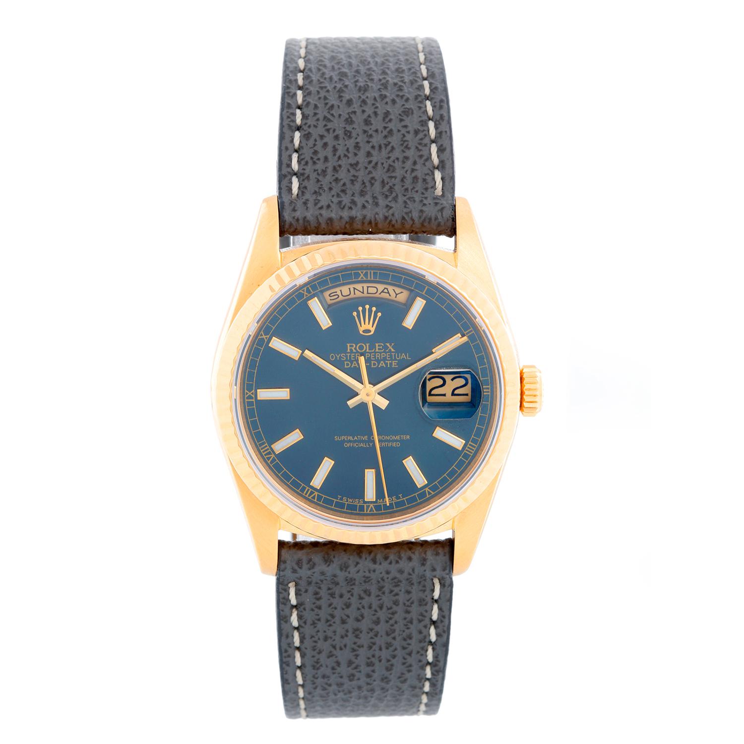 Men's Gold Rolex President Day-Date on a Strap Watch 18238 - Automatic winding, 31 jewels, double Quickset, sapphire crystal. 18k yellow gold case and fluted bezel (36mm diameter). Custom blue/ green dial. Grey leather strap with tang buckle .