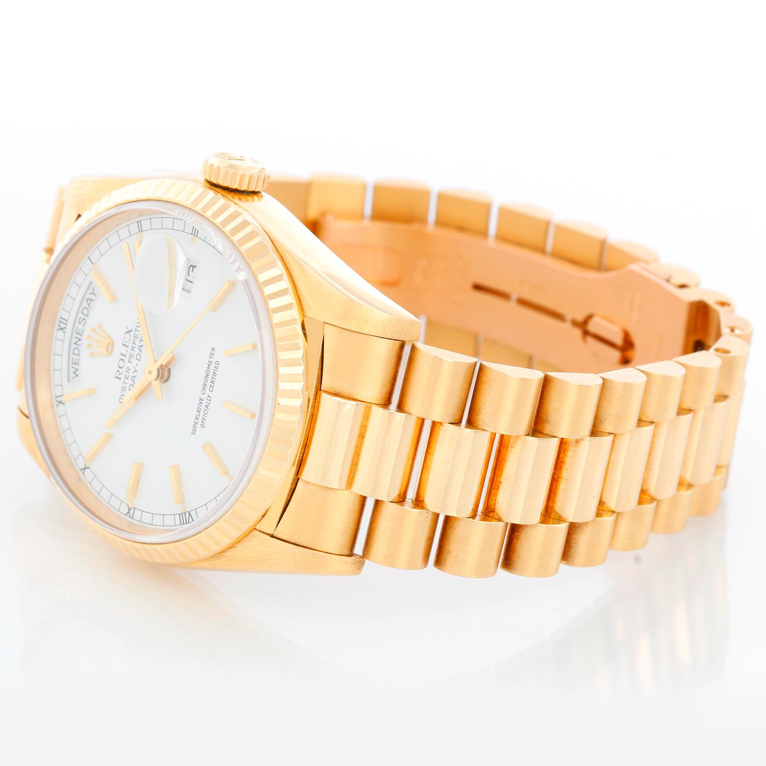 Men's Gold Rolex President Day-Date Watch 18238 - Automatic winding, 31 jewels, double Quickset, sapphire crystal. 18k yellow gold case and fluted bezel (36mm diameter). White dial with stick hour markers. 18k yellow gold President bracelet.