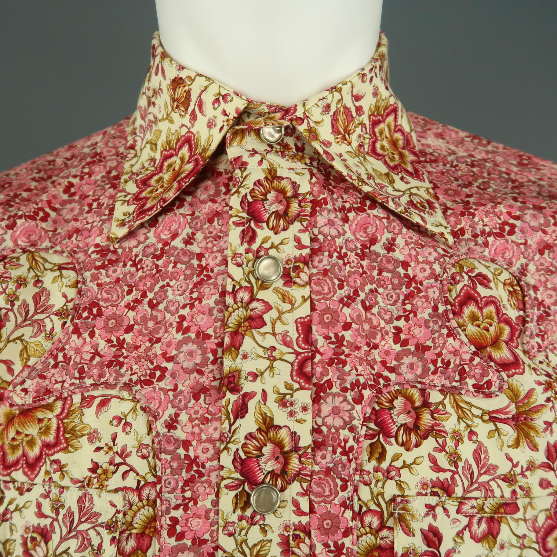 Archive GUCCI by TOM FORD Spring Summer 2004 Collection cowboy style shirt comes in beige floral print cotton with a pointed spread collar, patch flap pockets, pearl snap closures, and pink and red floral western contrast details and cuffs. Made in