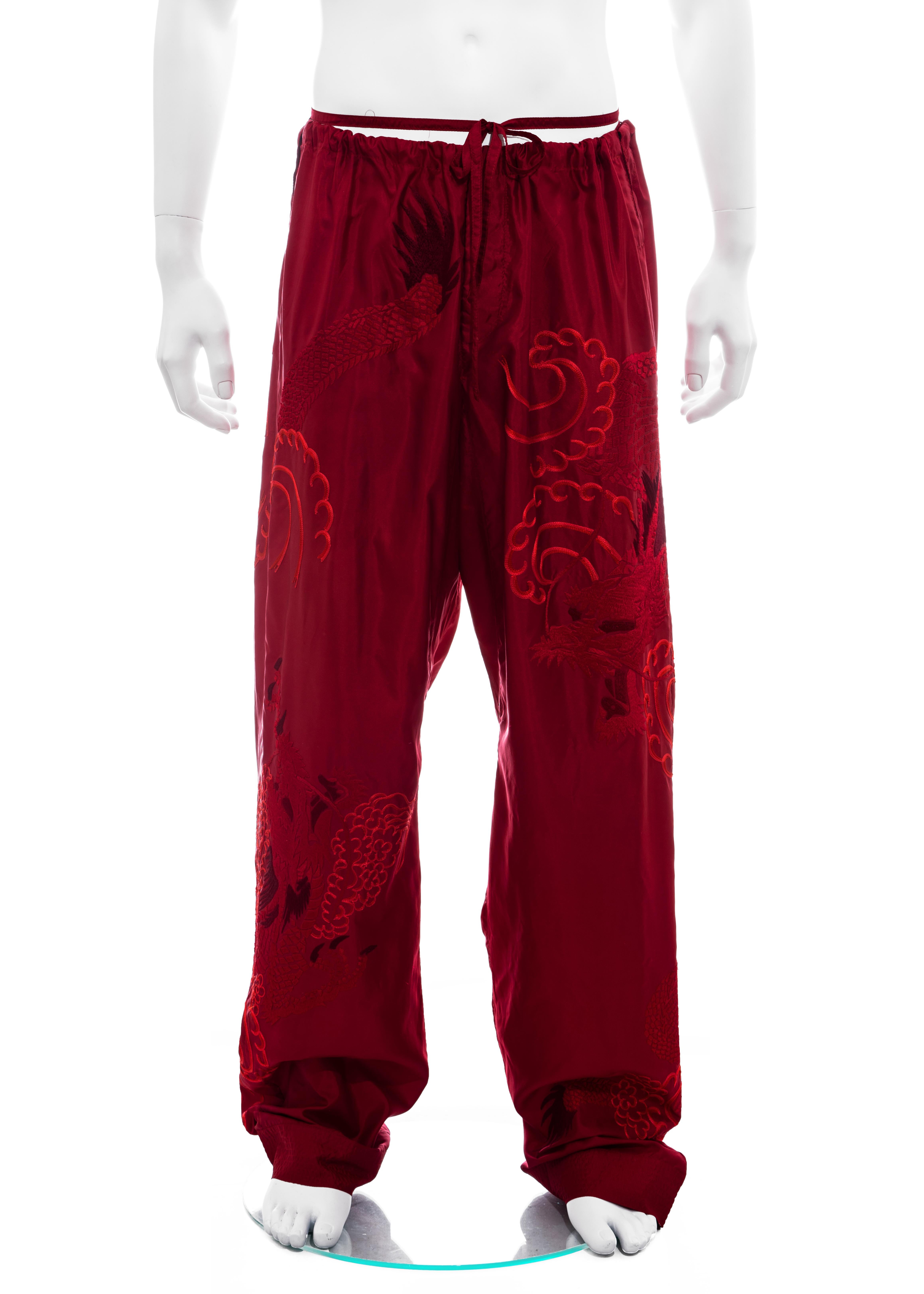 ▪ Men's Gucci red silk drawstring pants 
▪ Designed by Tom Ford
▪ 100% Silk
▪ Wide leg 
▪ Embroidered dragon design 
▪ Size 52 - Extra Large
▪ Spring-Summer 2001