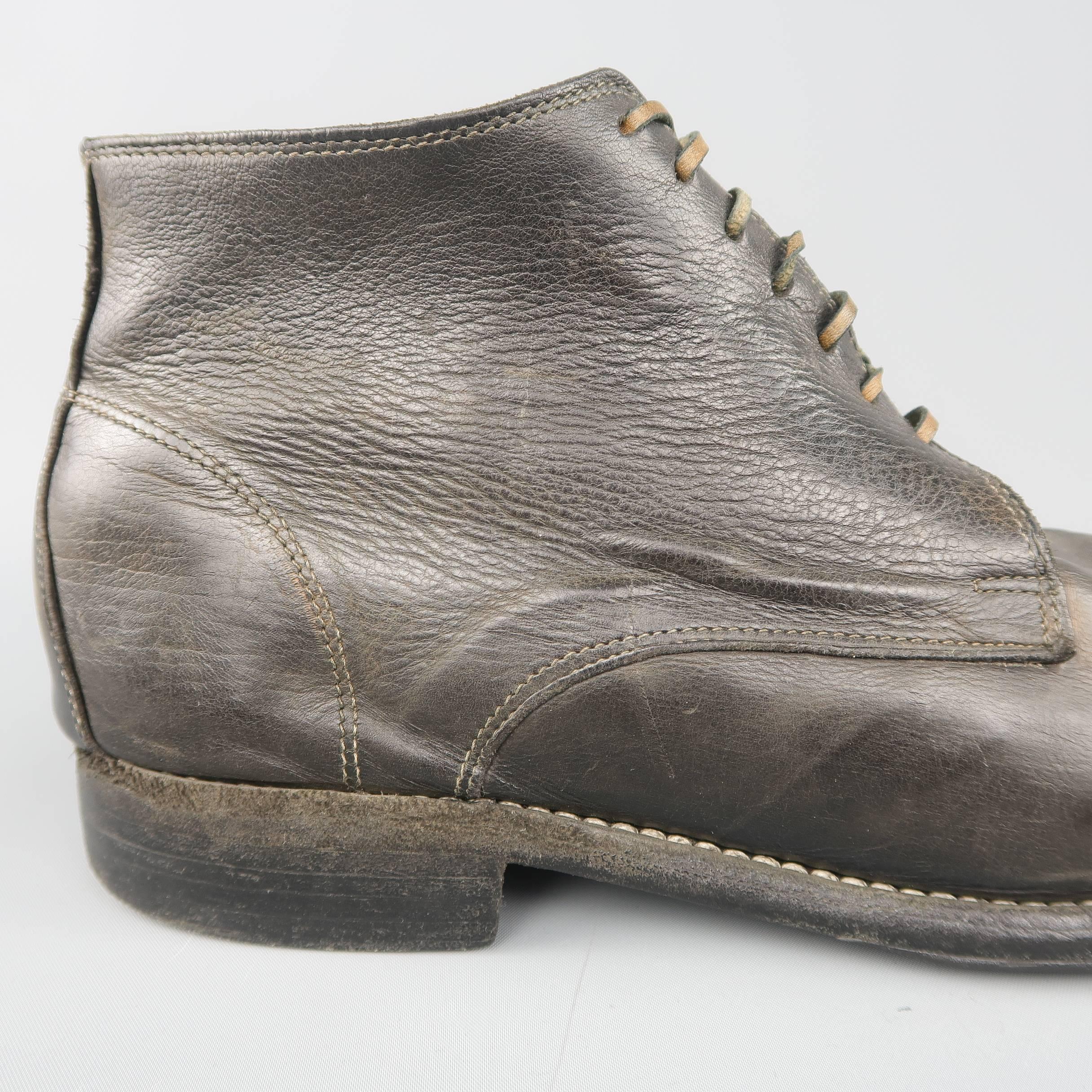 GUIDI desert ankle boots come in distressed donkey leather with unique qualities throughout, a round toe, and leather laces. With box and extra set of ties. Made in Italy.
 
Good Pre-Owned Condition.
Marked: IT 54
 
Outsole: 12 x 4 in.
Heel:1