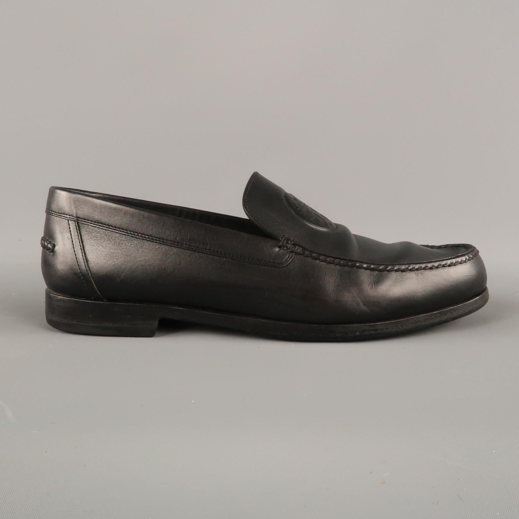 HERMES Slip On Loafers Shoes comes in a black tone in a solid leather material, with an embossed logo apron, resoled. As is. With dust bags. Made in Italy.
 
Very Good Pre-Owned Condition.
Marked: IT 41 1/2
 
Outsole: 11.5 x 4 in.