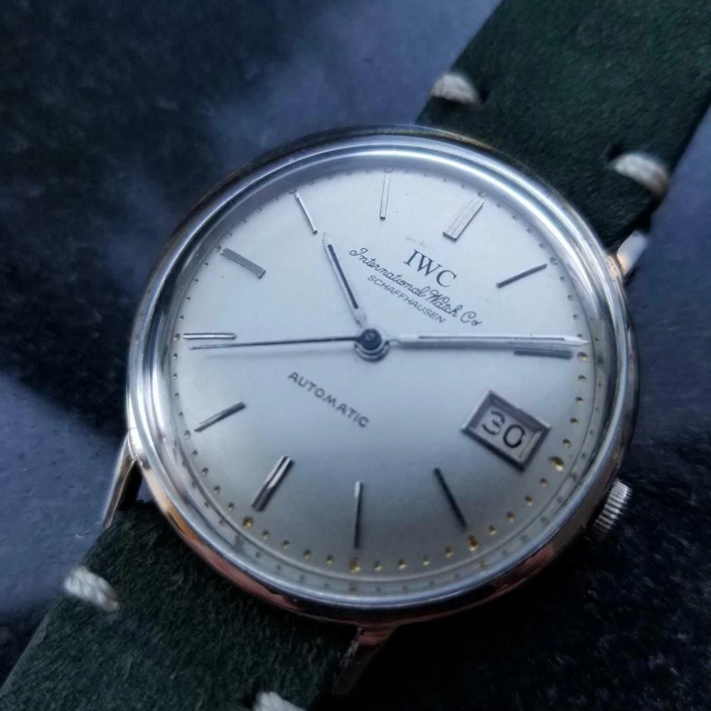 Timeless luxury, men's 18k solid white gold IWC cal.8541 date automatic, c.1950s. Verified authentic by a master watchmaker. Gorgeous silver vintage IWC signed dial, applied indice hour markers, silver minute and hour hands, sweeping central second