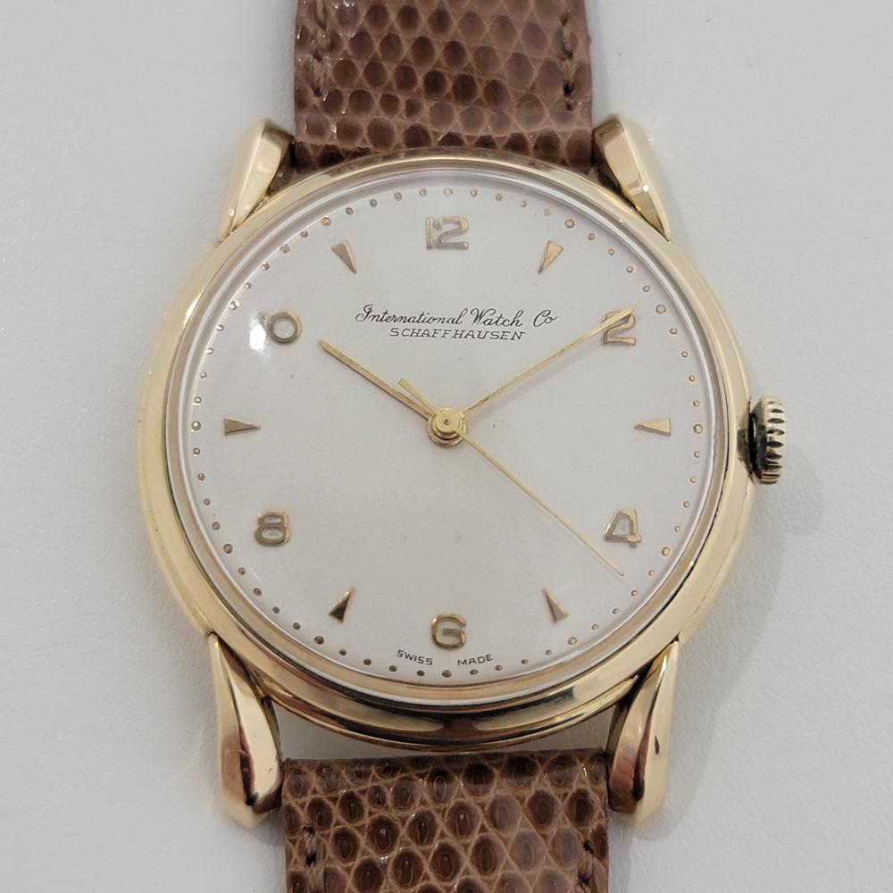 Timeless luxury, Men's IWC Schaffhausen solid 18k gold manual wind dress watch, c.1960s. Verified authentic by a master watchmaker. Gorgeous, IWC Schaffhausen signed dial, applied dagger and Arabic numeral hour markers, minute and hour hands,