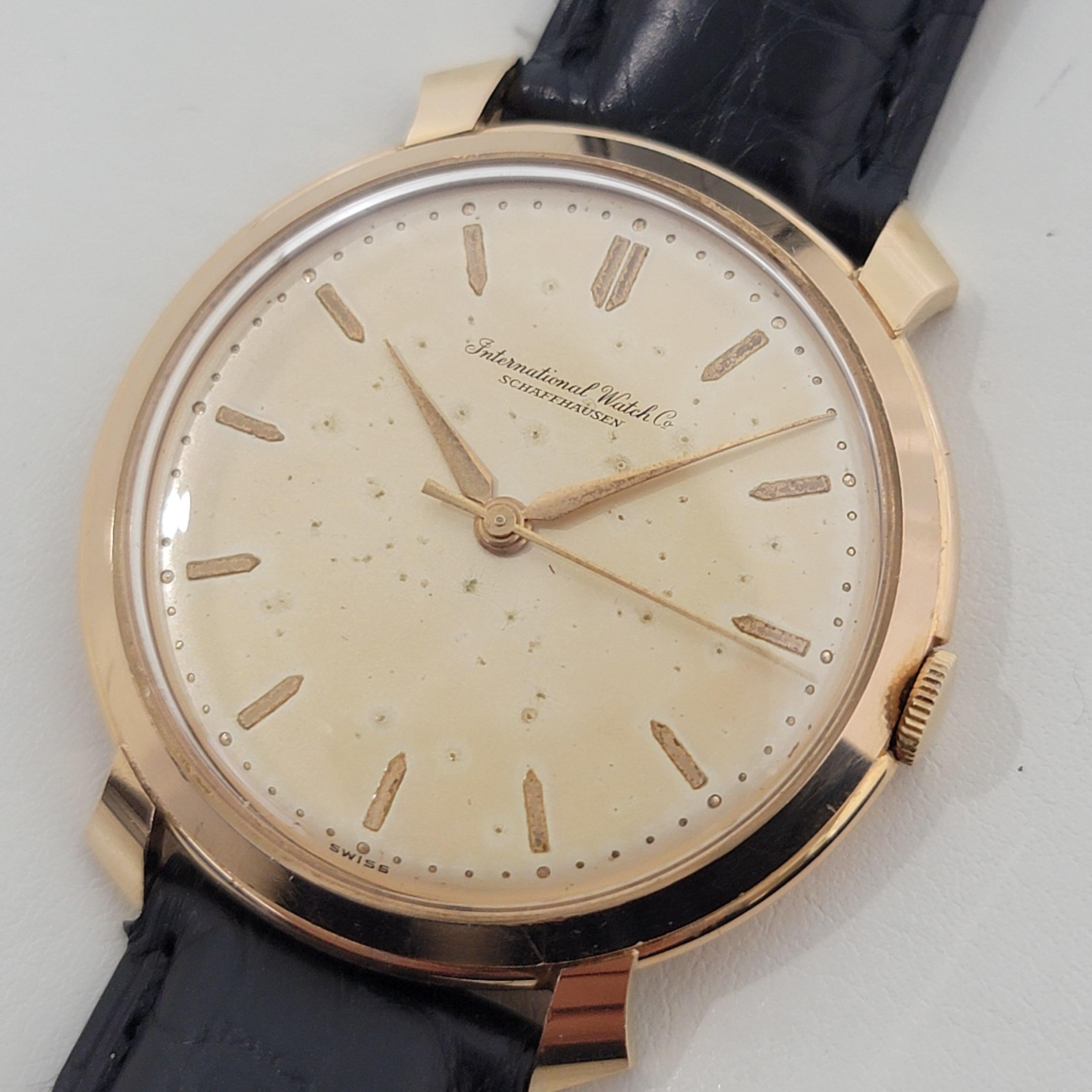  Timeless luxury, Men's large size IWC Schaffhausen solid 18k rose gold dress watch, c.1960s, unrefurbished. Verified authentic by a master watchmaker. Gorgeous, untouched IWC tropical dial, applied dagger hour markers, minute and hour hands,