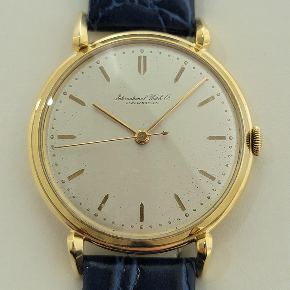 Timeless classic, Men's 18k solid gold IWC Schaffhausen dress watch in jumbo 37mm size, c.1960s, in excellent working condition. Verified authentic by a master watchmaker. Gorgeous IWC dial, index hour markers, gilt minute and hour hands, sweeping