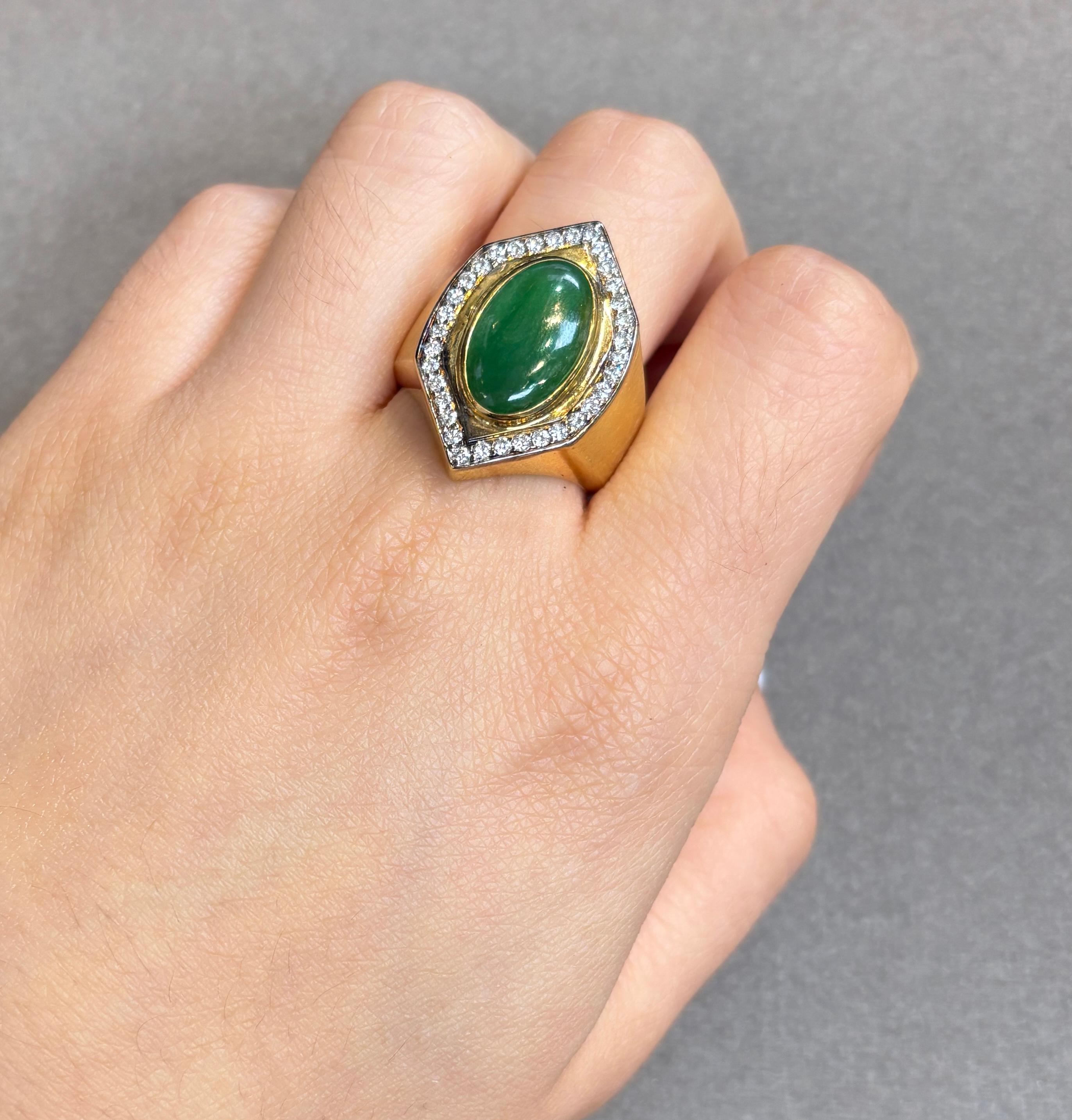 Men's Jade and Diamond Ring

A yellow gold ring set with an oval jade and accented by 34 round cut diamonds, 

Approximate Jade Weight: 4.27 carats
Approximate Diamond Weight: .80 cts
Approximate Weight: 22.5 grams
Ring Size: 9.75
Complimentary