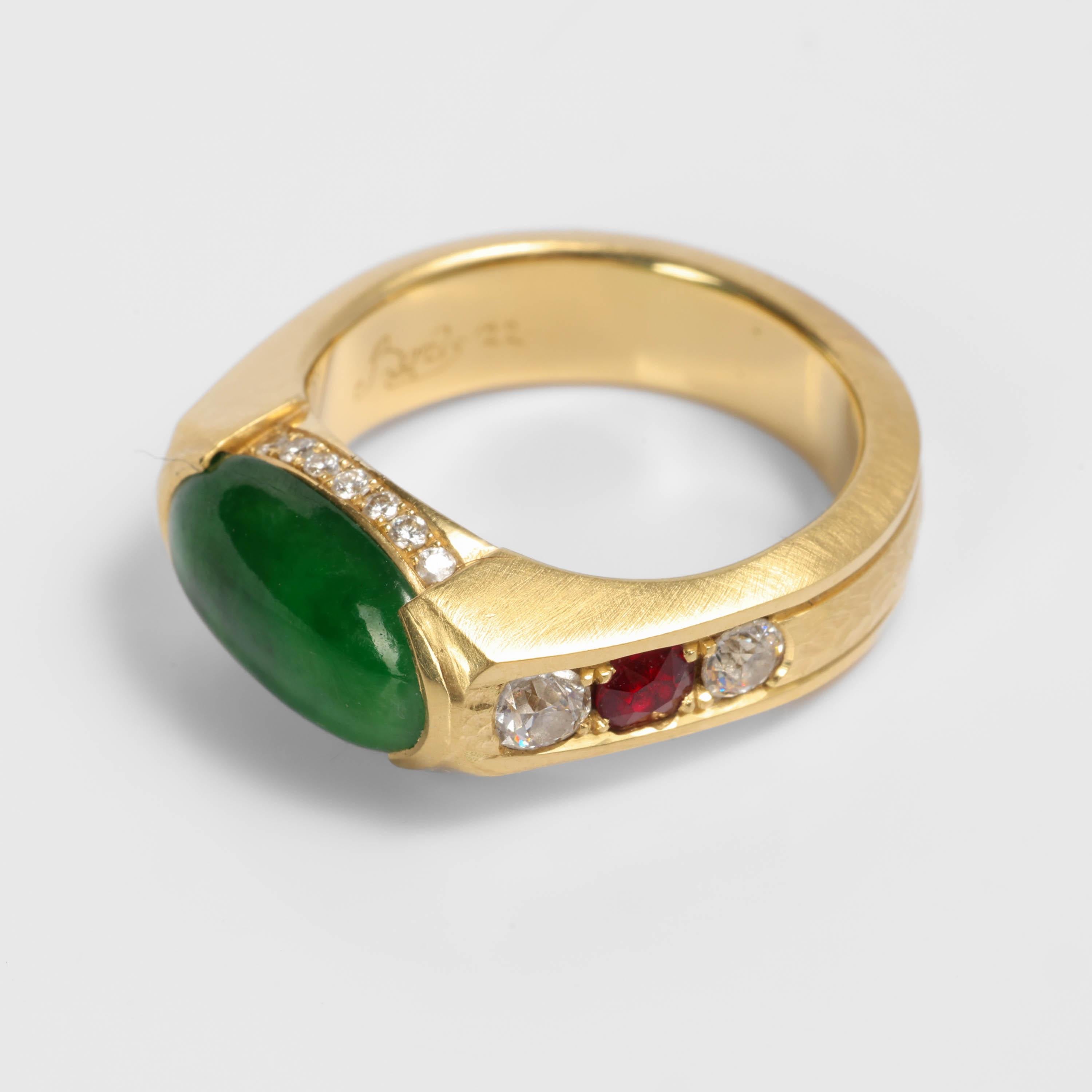 This custom, handmade jade ring features an antique, old-mine deep 