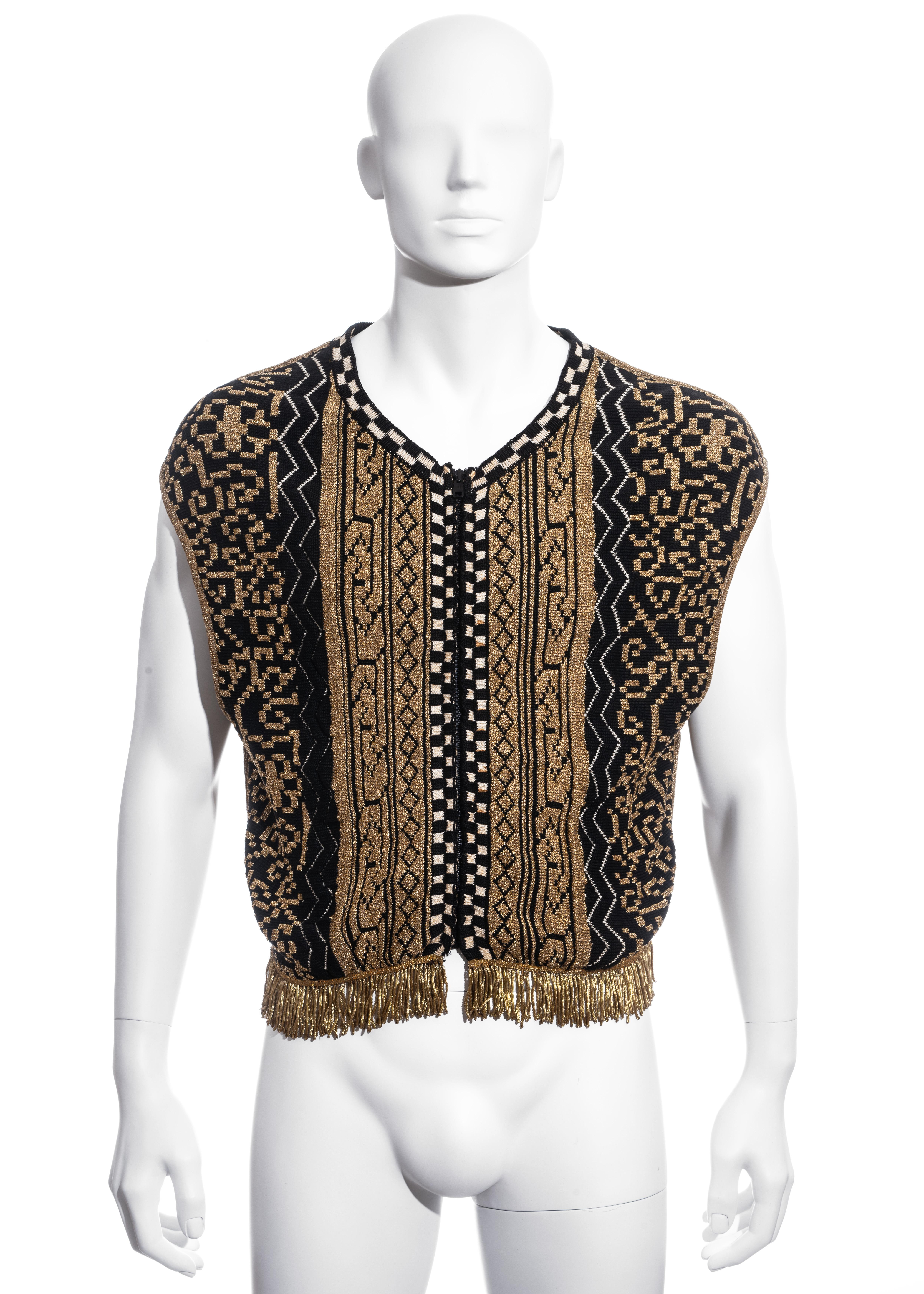 ▪ Men's Jean Paul Gaultier zip-up vest
▪ Metallic gold and black Lurex knit 
▪ 55% Cotton, 21% Polyester, 19% Nylon, 5% Elastane  
▪ Fringed hem
▪ Size 48
▪ Fall-Winter 1985
