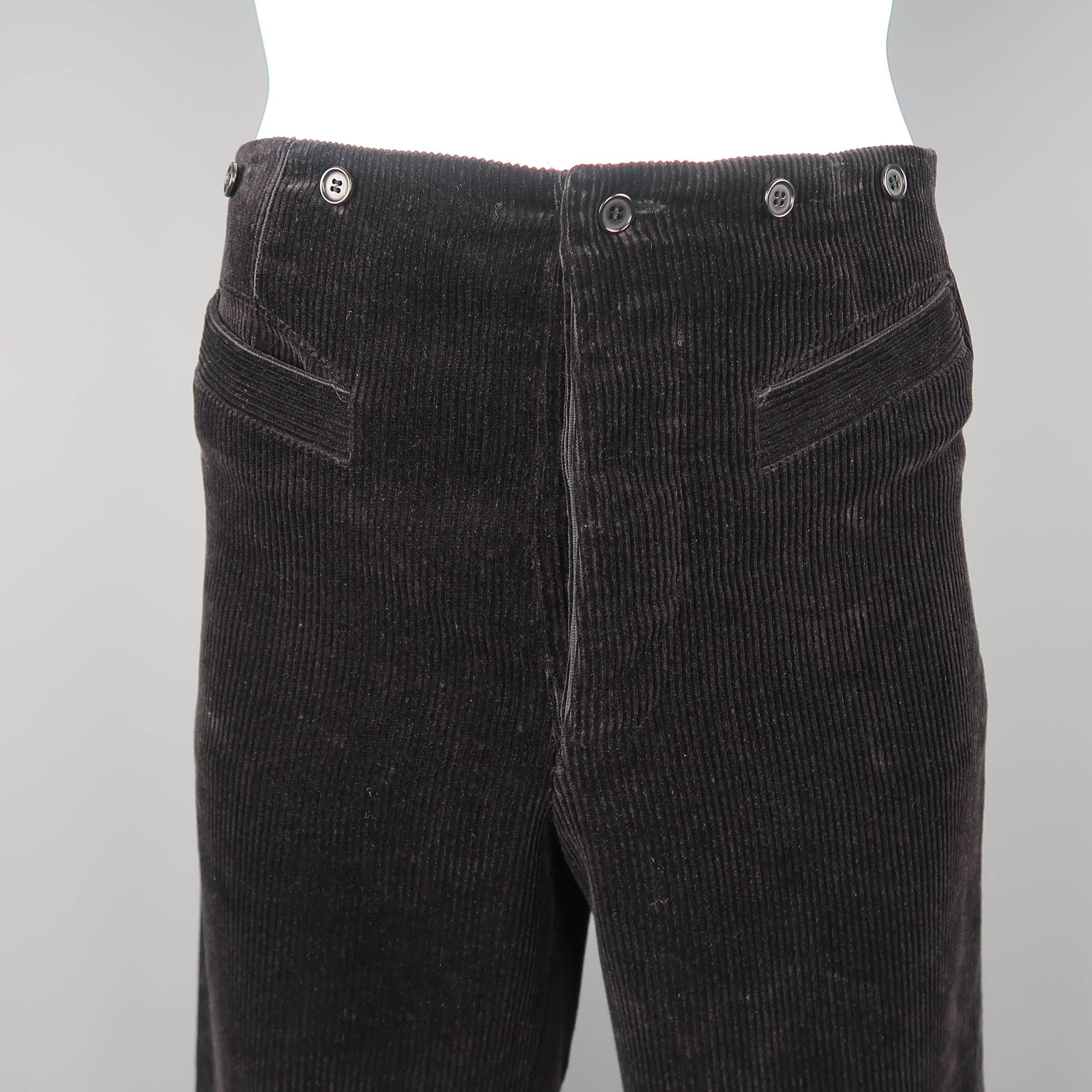 Vintage JEAN PAUL GAULTIER dress pants come in black corduroy with a high rise, braces buttons, relaxed leg and gold tone bull head button cuffs. Minor wear on buttons. As-is. Made in Italy.
 
Good Pre-Owned Condition.
Marked: IT 50
 
Measurements:
