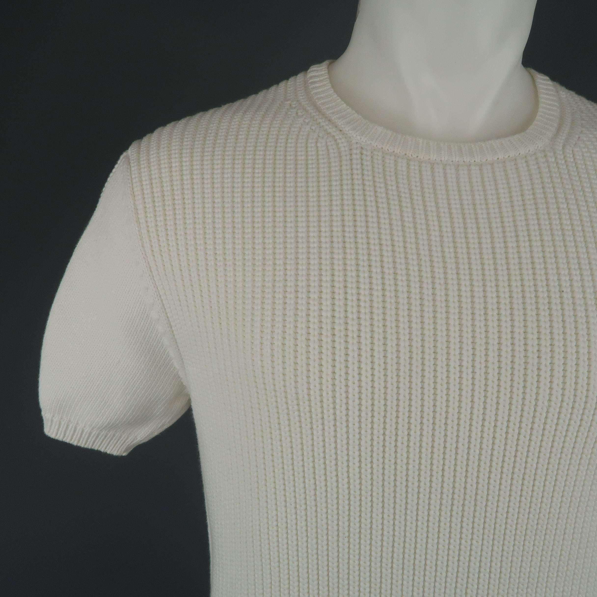 JIL SANDER  pullover sweater comes in white cotton blend fisherman knit with a crewneck, and mixed texture paneled short sleeves. Made in Italy.
 
Excellent Pre-Owned Condition.
Marked: IT 50
 
Measurements:
 
Shoulder: 19 in.
Chest: 42 in.
Sleeve: