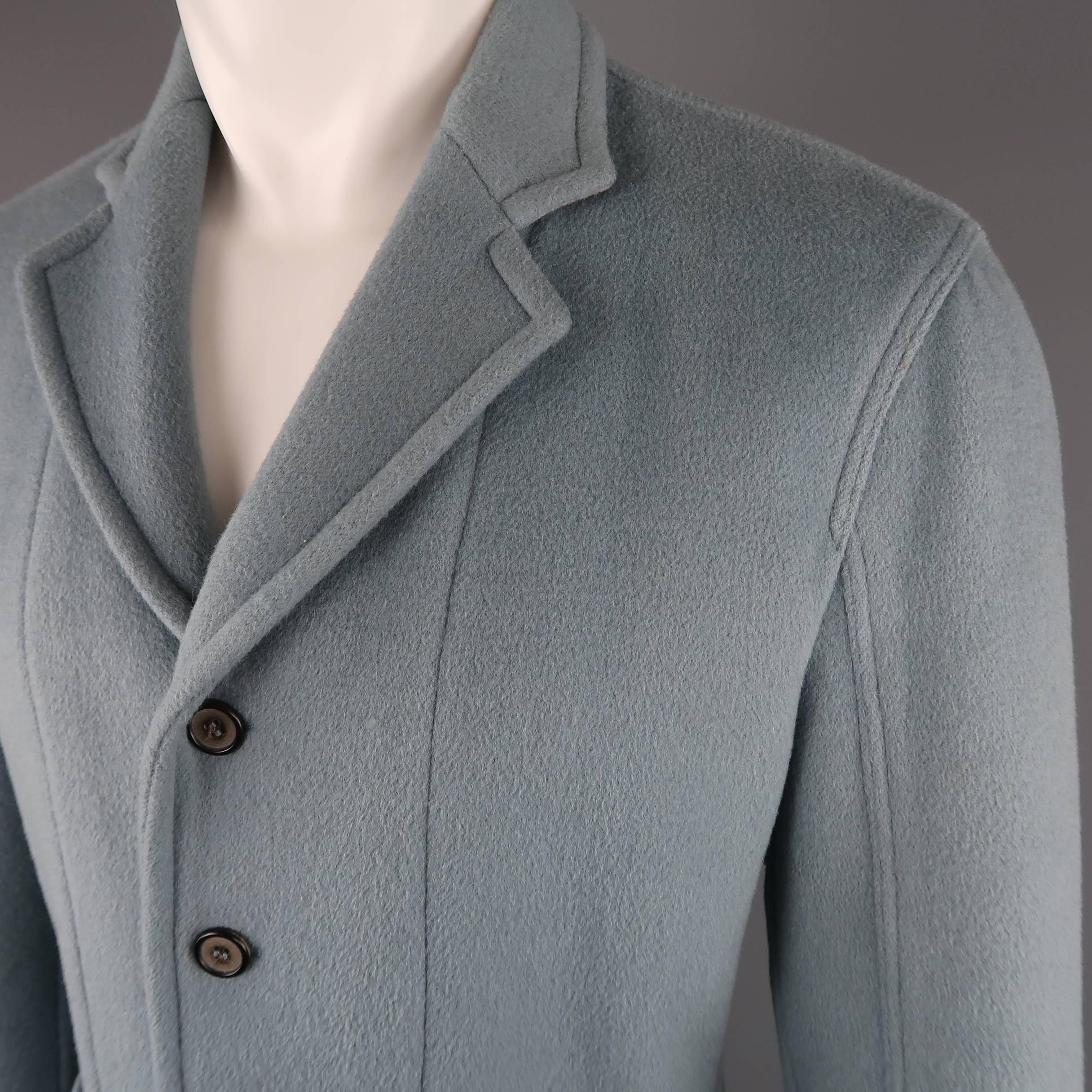 JOHN BARTLETT jacket comes in muted light blue wool angora blend felt and features a four button front, notch lapel, and patch pockets. Imperfection on back shown in detail shot. As-is. Made in Italy.
 
Fair Pre-Owned Condition.
Marked: IT 48
