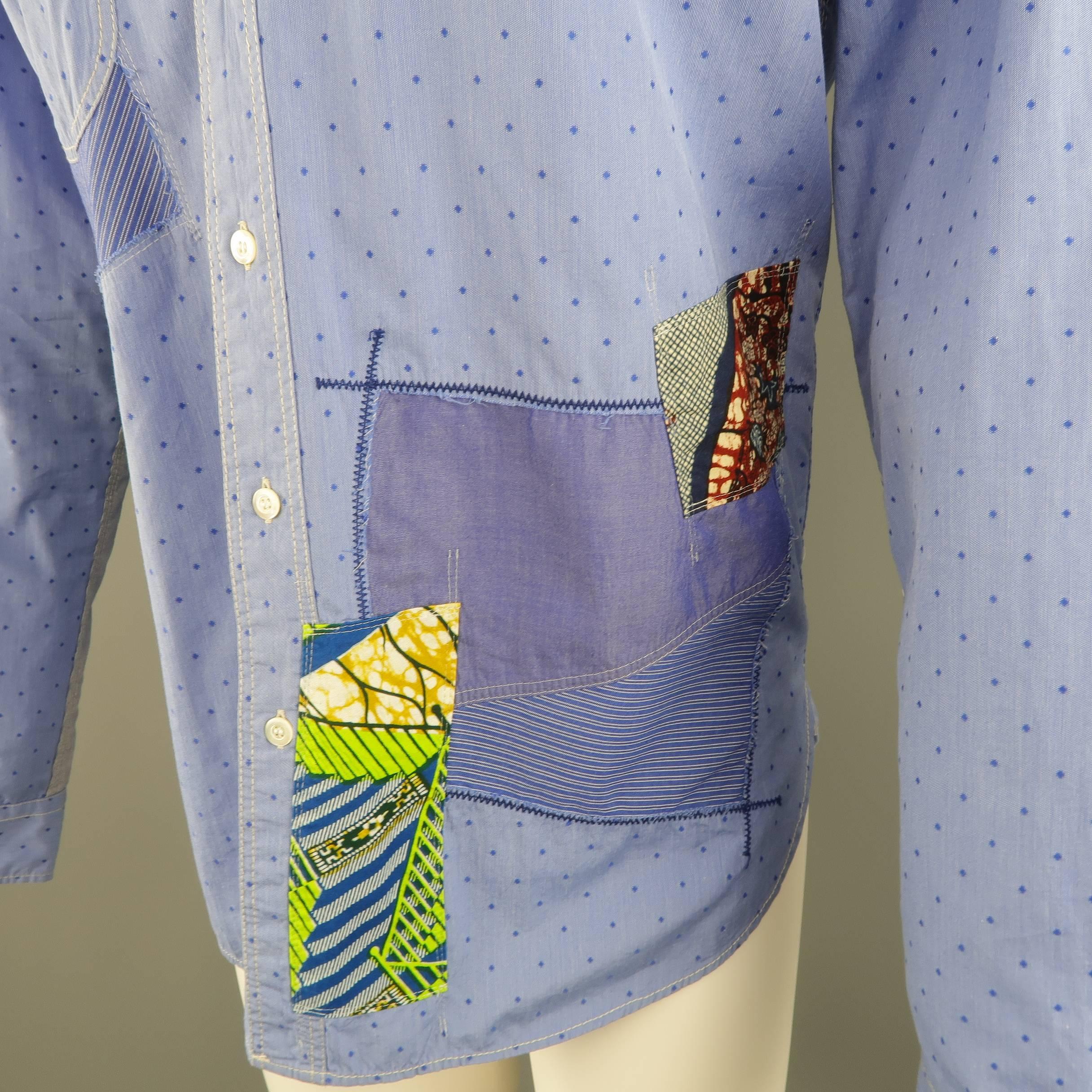 JUNYA WATANABE MAN shirt comes in spotted blue cotton with a pointed collar, patch pocket, and printed patchwork motif. Made in Italy.
 
Excellent Pre-Owned Condition.
Marked: L
 
Measurements:
 
Shoulder: 17 in.
Chest: 46 in.
Sleeve: 27 in.
Length: