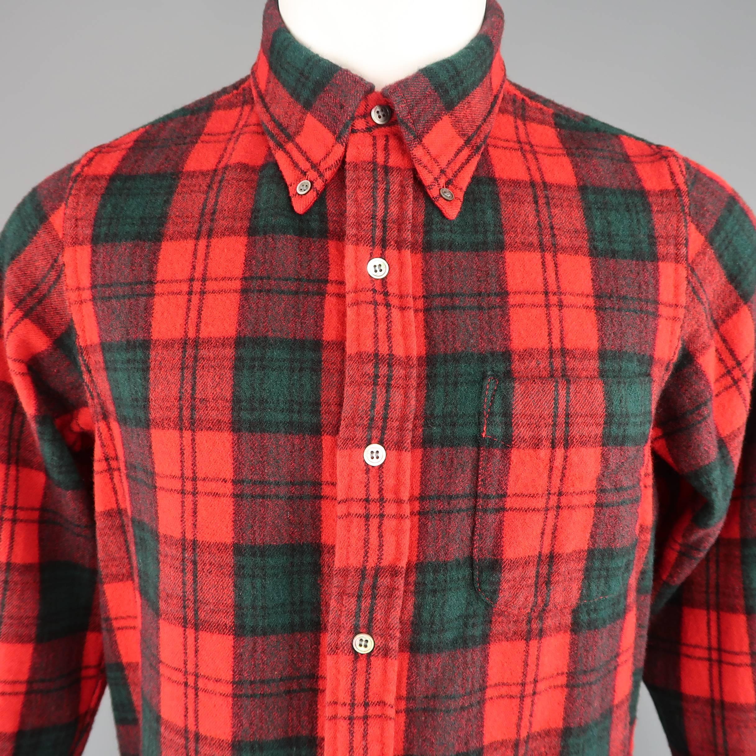 JUNYA WATANABE MAN shirt comes in red and green plaid wool blend flannel with a button down pointed collar and patch pocket. Made in Japan.
 
Excellent Pre-Owned Condition.
Marked: S
 
Measurements:
 
Shoulder: 15 in.
Chest: 42 in.
Sleeve: 25