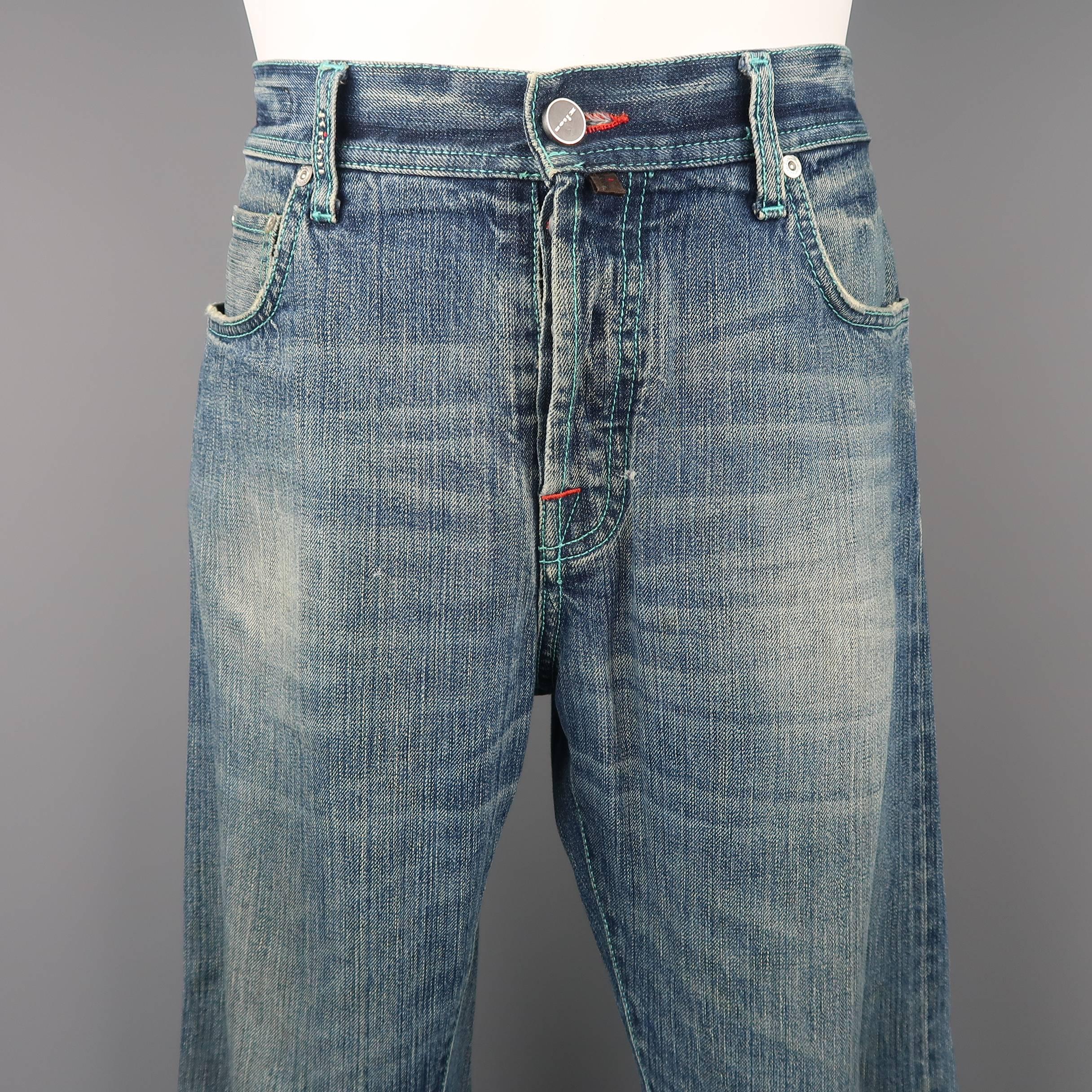 Limited Edition KITON jeans come in a dirty washed selvedge denim with enamel button fly and aqua contrast stitching. Made in Italy.
 
Fair Pre-Owned Condition.
Marked: 34 (5 out of 48)
 
Measurements:
 
Waist: 34 in.
Rise: 11 in.
Inseam: 29 in.
