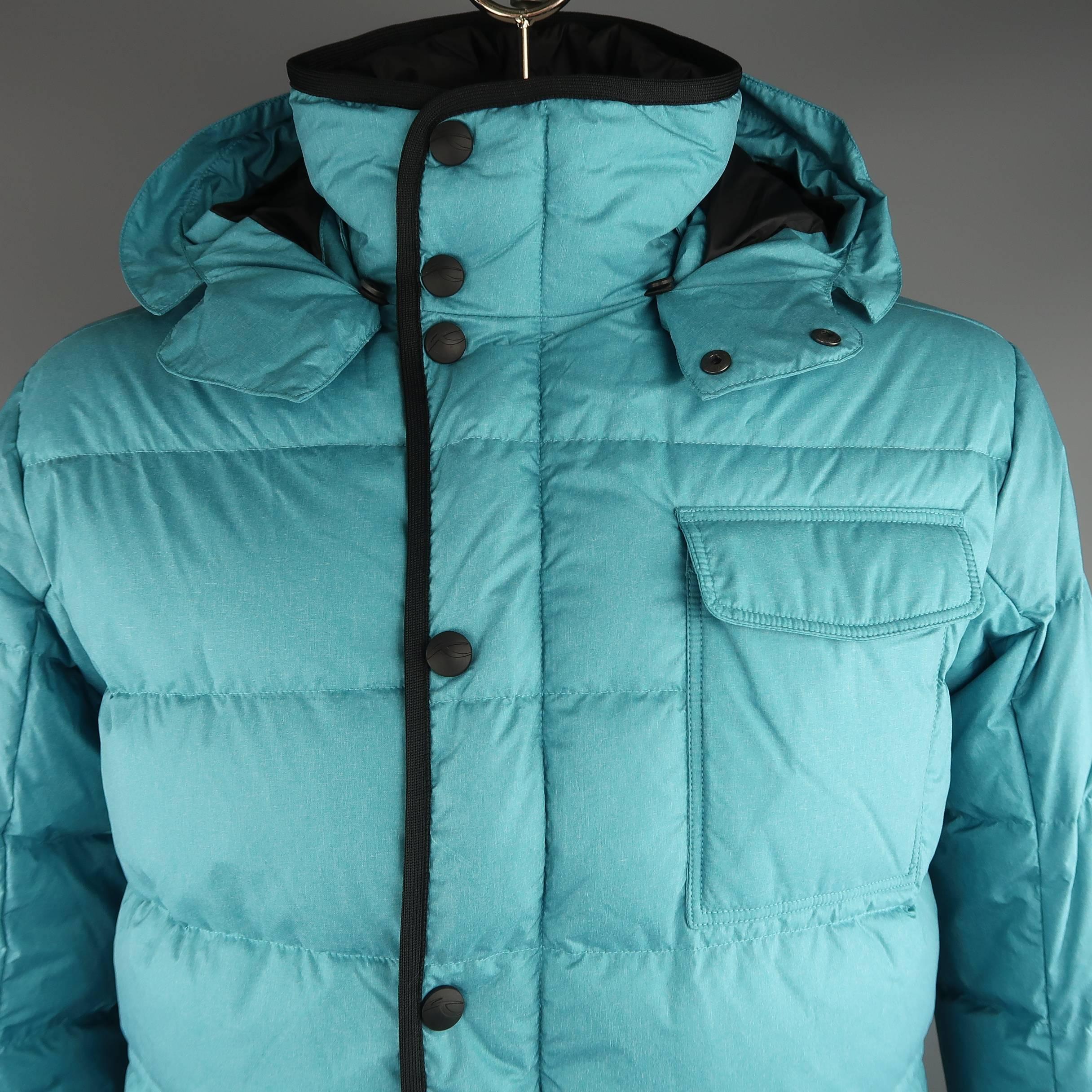 KHUS ski parka comes in quilted down feather teal polyester with a hight neck, snap placket zip closure, flap pockets, and detachable hoot. Made in Slovakia.
 
Excellent Pre-Owned Condition.
Marked: 52 L
 
Measurements:
 
Shoulder: 20 in.
Chest: 48